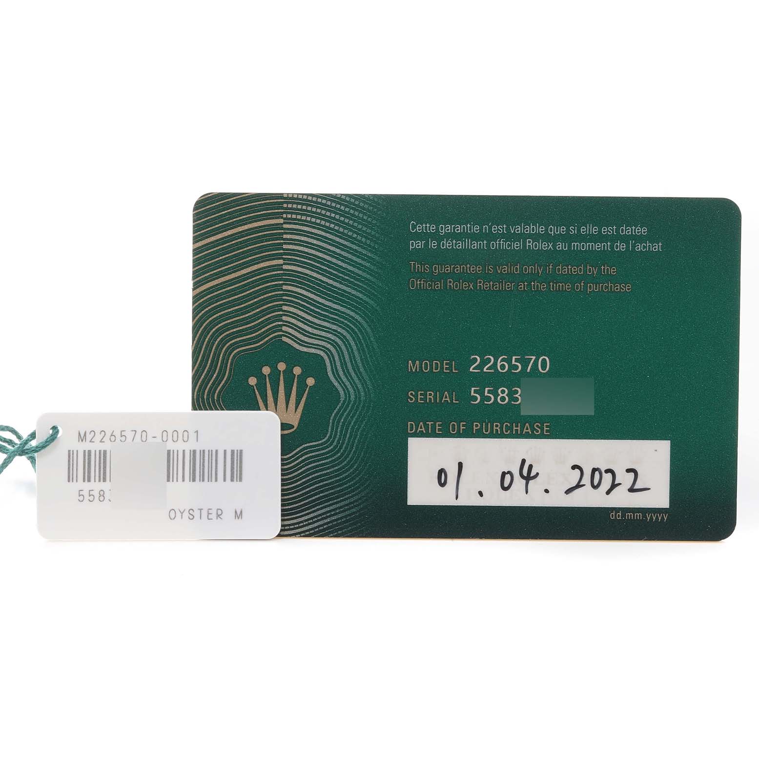 The image shows a warranty card for a Rolex Explorer 226570 Men
s Stainless Steel White Dial 226570 Men
s Stainless Steel White Dial model 226570 with purchase date 01.04.2022 and a separate tag.