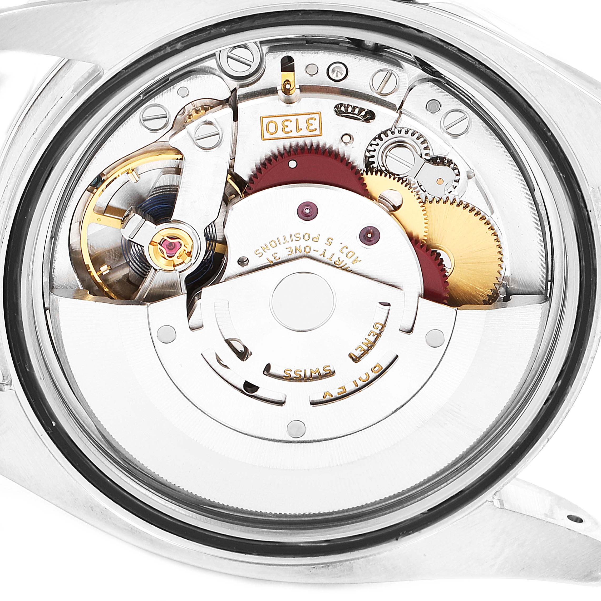 This image shows the movement mechanism of a Rolex Oyster Perpetual 116000 Men's Stainless Steel Champagne Dial 116000 Men's Stainless Steel Champagne Dial watch from a rear angle.