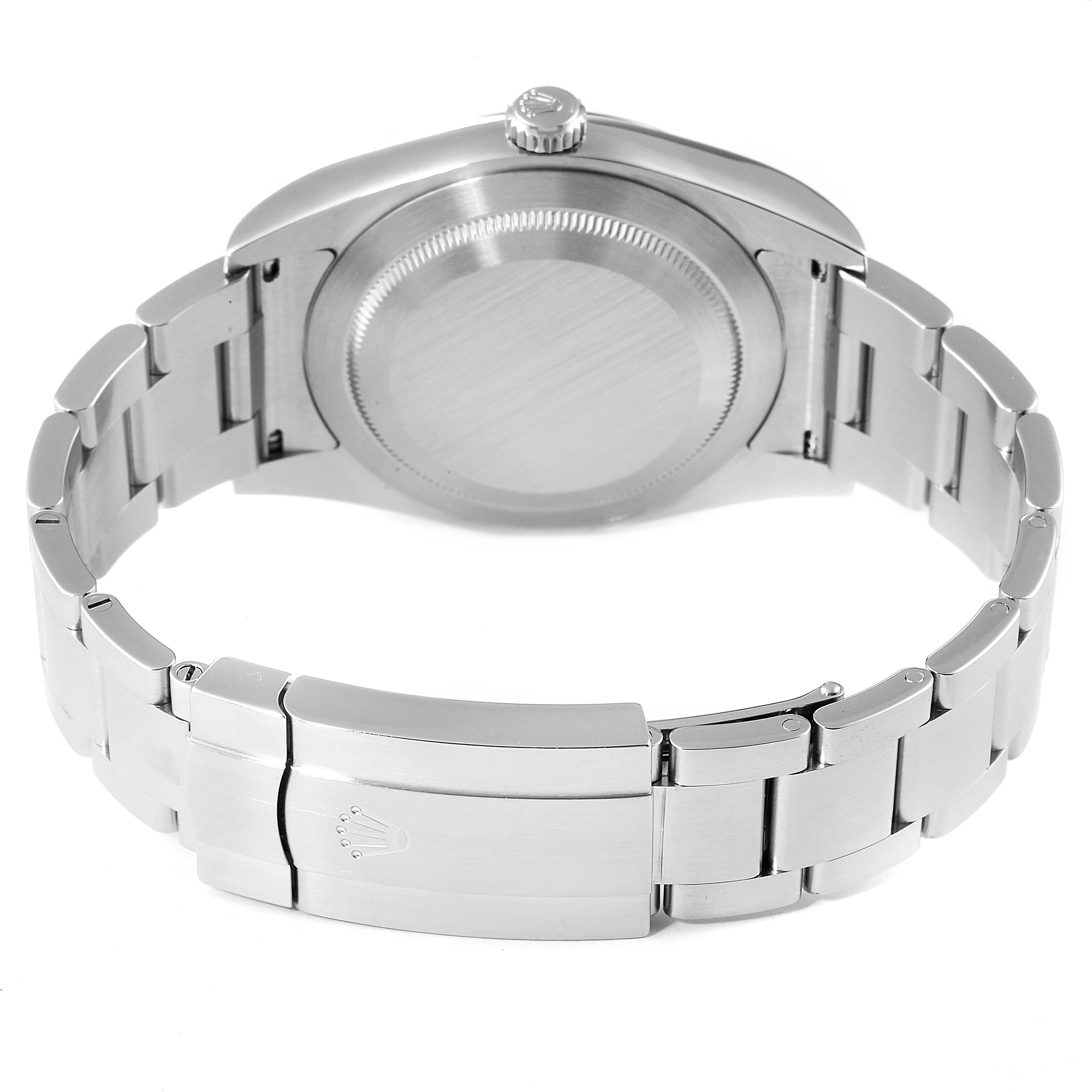 This image shows the back view of a Rolex Oyster Perpetual 114300 Men's Stainless Steel Grey Dial 114300 Men's Stainless Steel Grey Dial watch, highlighting its case back and the bracelet with the clasp.