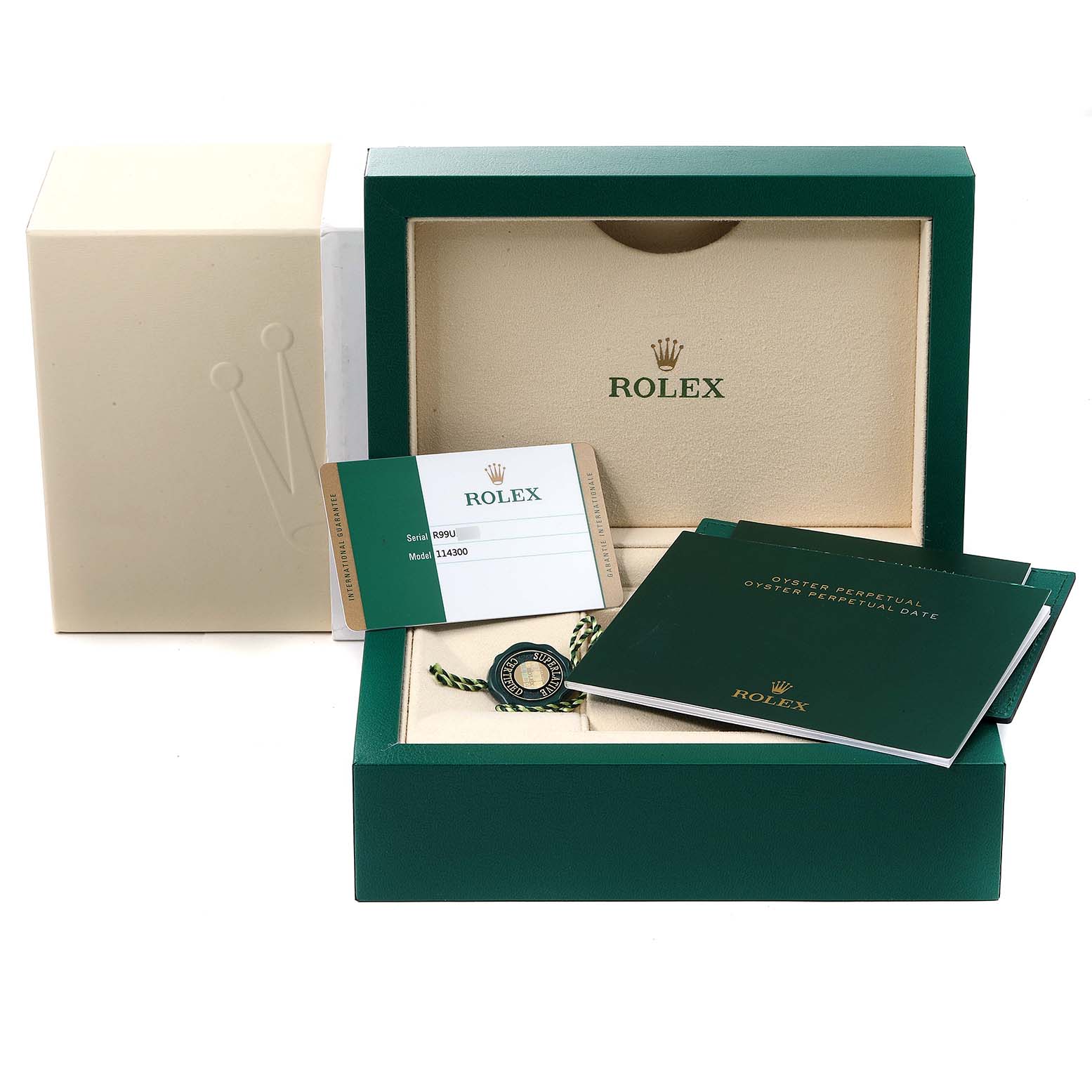 This image shows the packaging and documentation for a Rolex Oyster Perpetual 114300 Men's Stainless Steel Burgundy Dial 114300 Men's Stainless Steel Burgundy Dial watch, including the box, booklet, and tags.