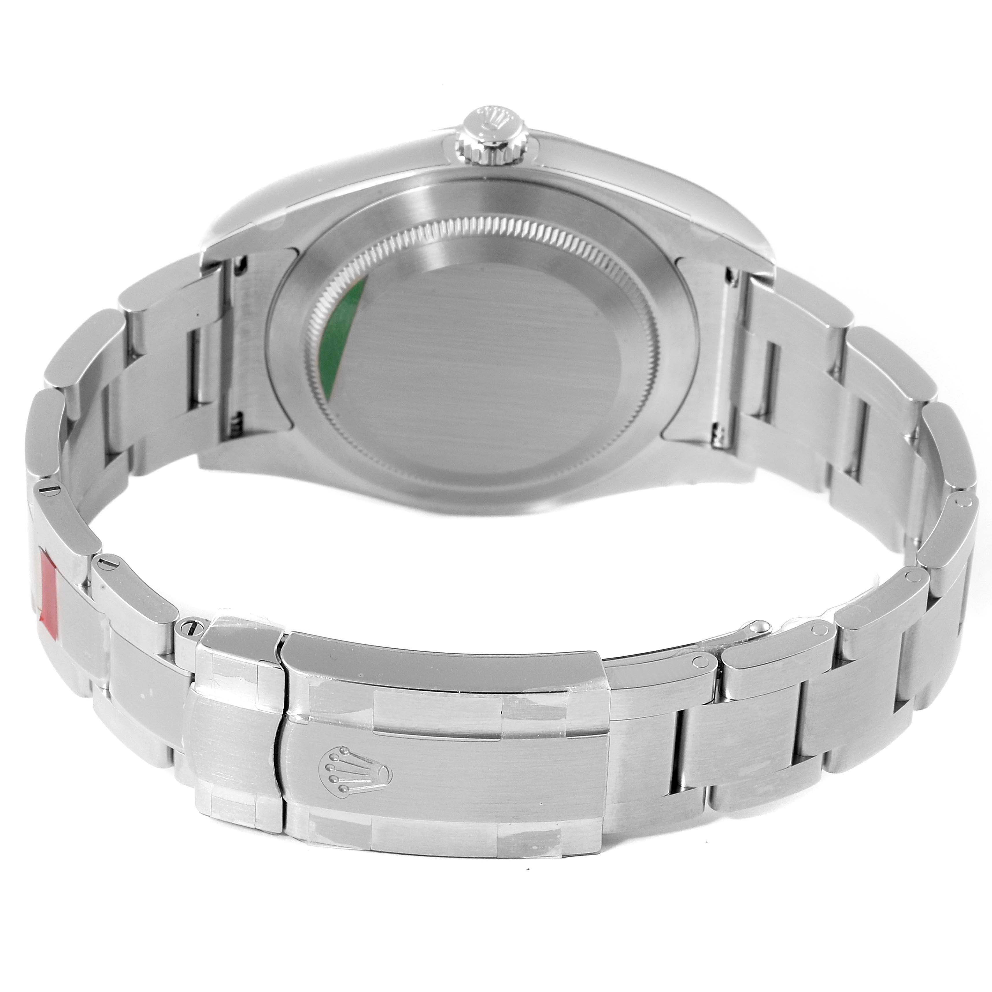 The image shows the back view of a Rolex Oyster Perpetual 114300 Men's Stainless Steel Burgundy Dial 114300 Men's Stainless Steel Burgundy Dial watch, including the case back, bracelet, and clasp.