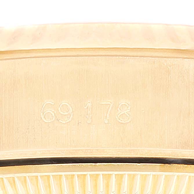 This close-up image shows the inside of the case or clasp of a Rolex President 69178 Women
s Yellow Gold Champagne Dial 69178 Women
s Yellow Gold Champagne Dial model, displaying the reference number 69178.