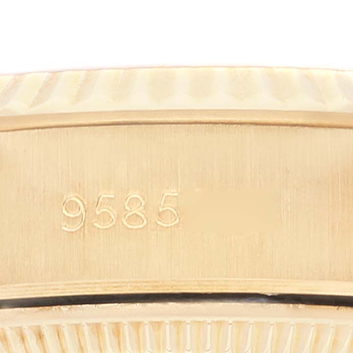 This image shows a close-up of the serial number "9585" on the bracelet clasp of a Rolex President 69178 Women
s Yellow Gold Champagne Dial 69178 Women
s Yellow Gold Champagne Dial model watch.