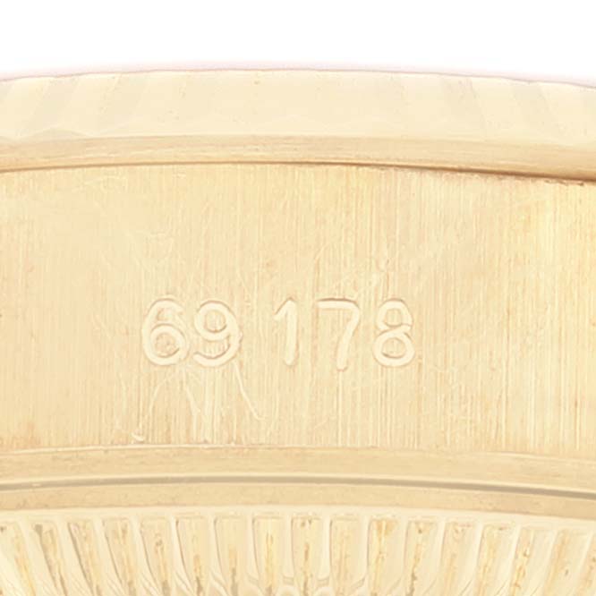 The image shows a close-up of the engraved model number (69178) on the President model by Rolex.