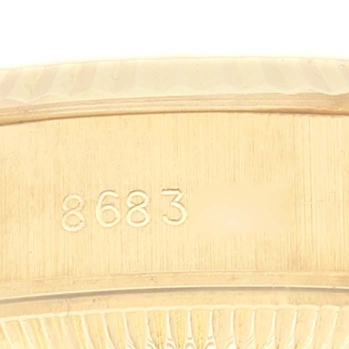 This image shows a close-up of the model number engraving on a Rolex President 69178 Women
s Yellow Gold Champagne Dial 69178 Women
s Yellow Gold Champagne Dial watch case.