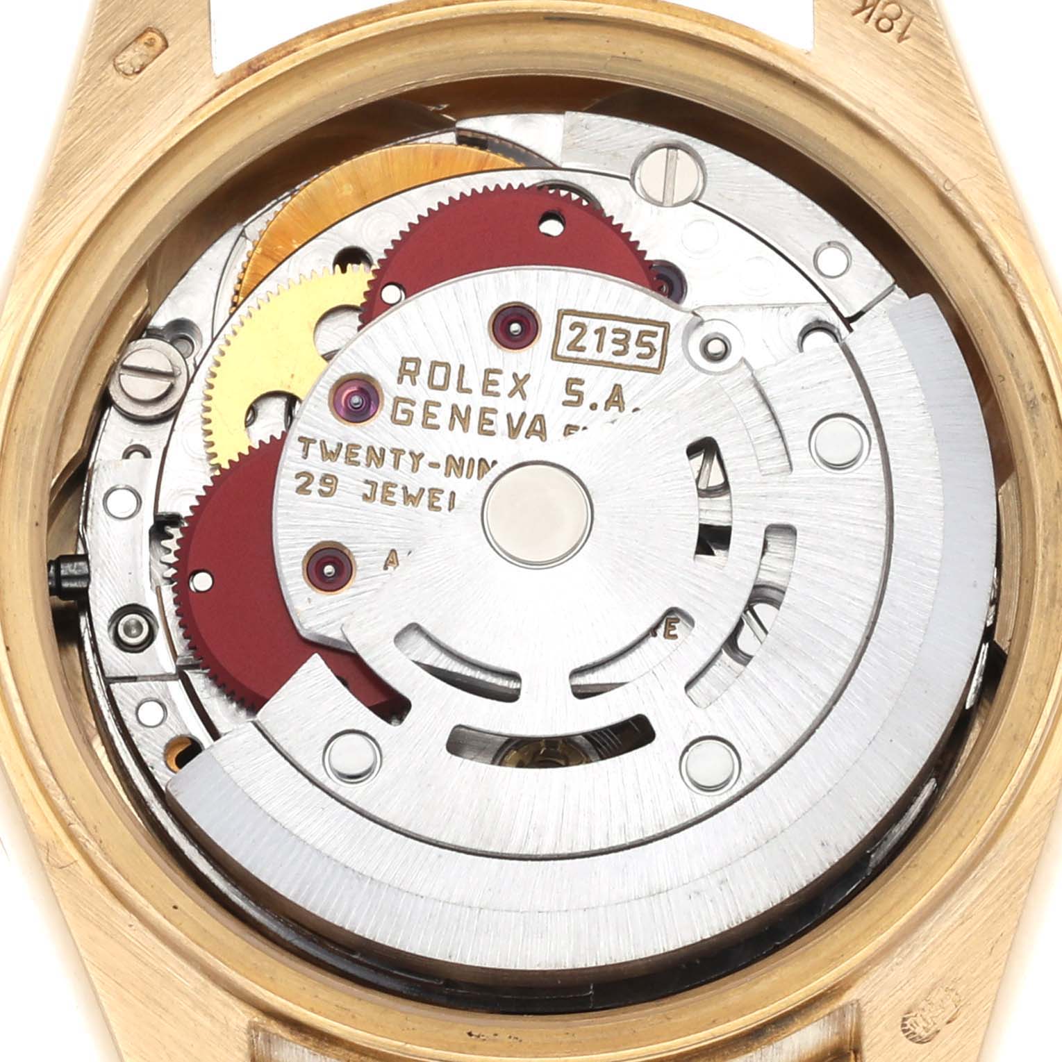 The image shows the internal movement of a Rolex President 69288 Women's Yellow Gold Champagne Dial 69288 Women's Yellow Gold Champagne Dial model, featuring gears and the rotor from a top view.