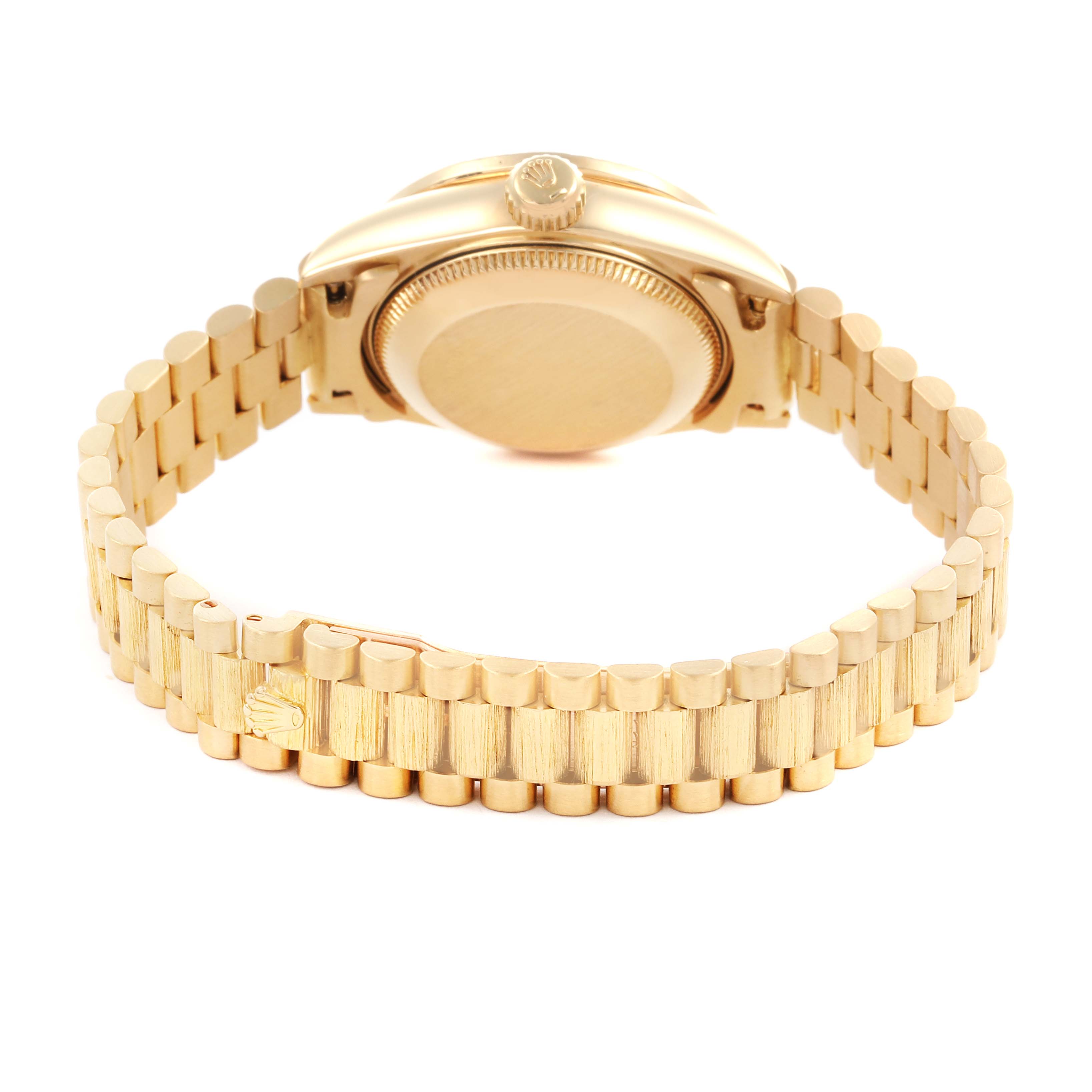 The image shows the back case and bracelet of a Rolex President 69288 Women's Yellow Gold Champagne Dial 69288 Women's Yellow Gold Champagne Dial model watch, viewed from the underside.