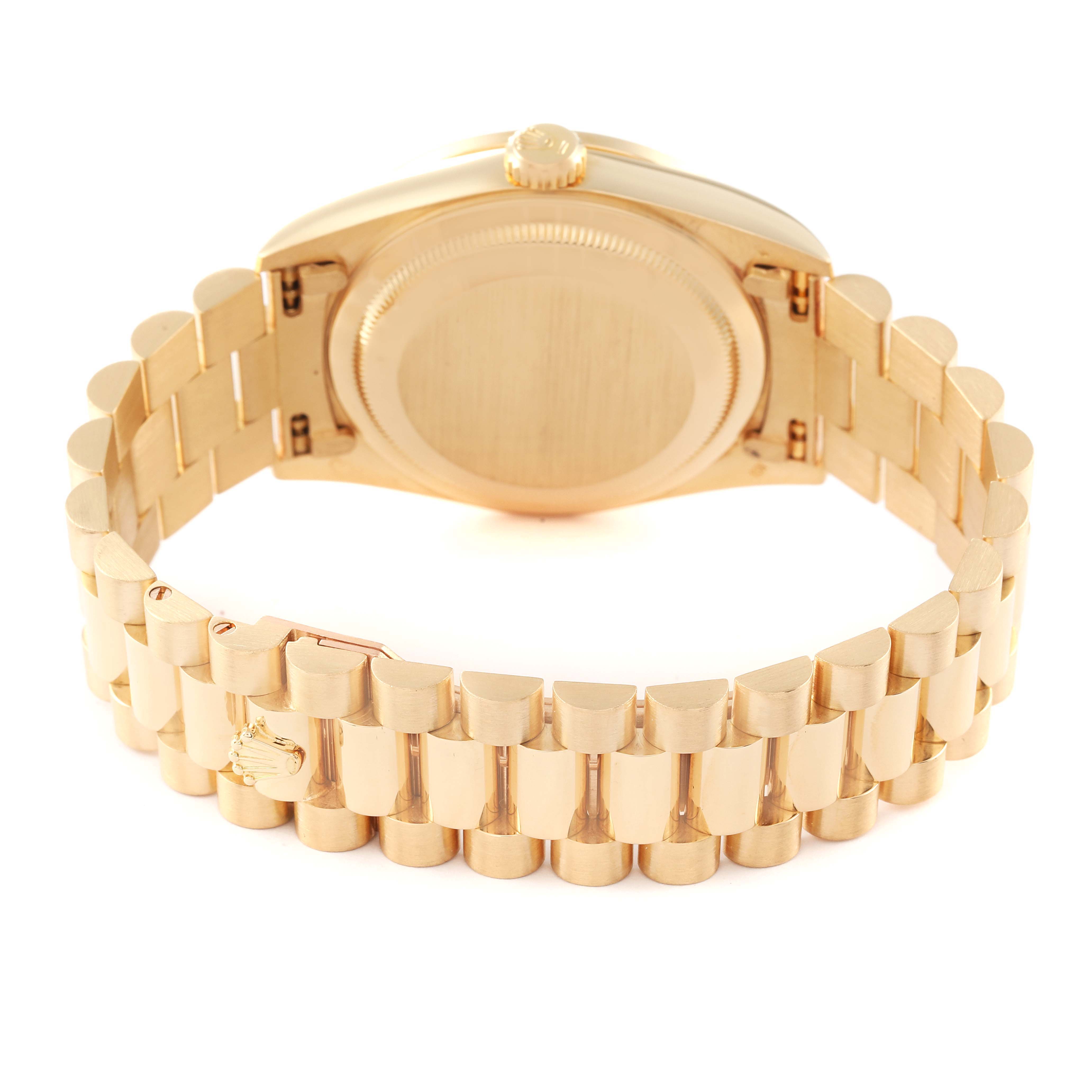 The image shows the back view of the Rolex President 18388 Men
s Yellow Gold Champagne Dial 18388 Men
s Yellow Gold Champagne Dial model, including its case back and bracelet.