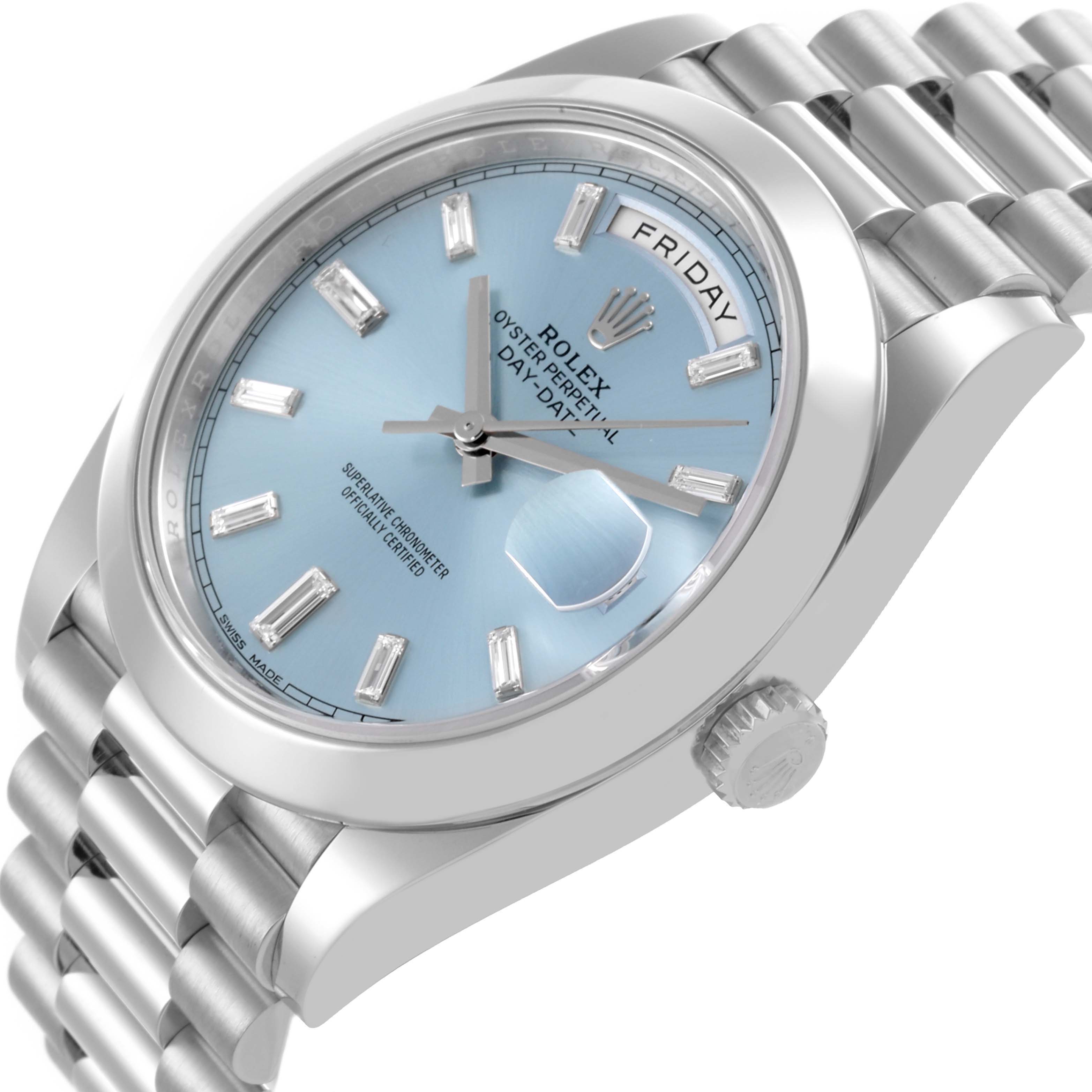 The Rolex President 228206 Men's Platinum Blue Dial 228206 Men's Platinum Blue Dial watch is shown at a tilted angle, displaying the dial, bezel, crown, and part of the bracelet.