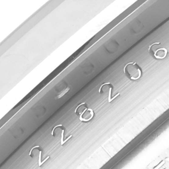This image shows a close-up angle of the inside bezel and serial number of the Rolex President 228206 Men's Platinum Blue Dial 228206 Men's Platinum Blue Dial model.