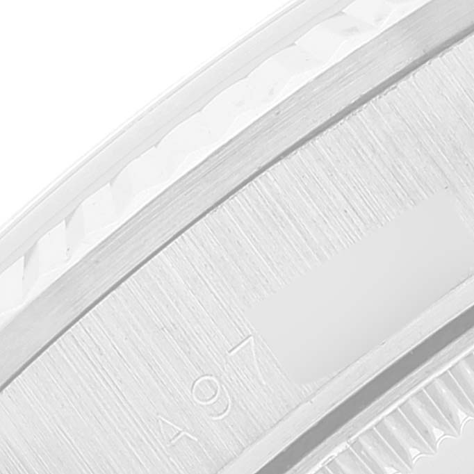 This image shows a close-up angle of the case side and bezel of a Rolex President 78279 Women's White Gold Blue Dial 78279 Women's White Gold Blue Dial model watch.