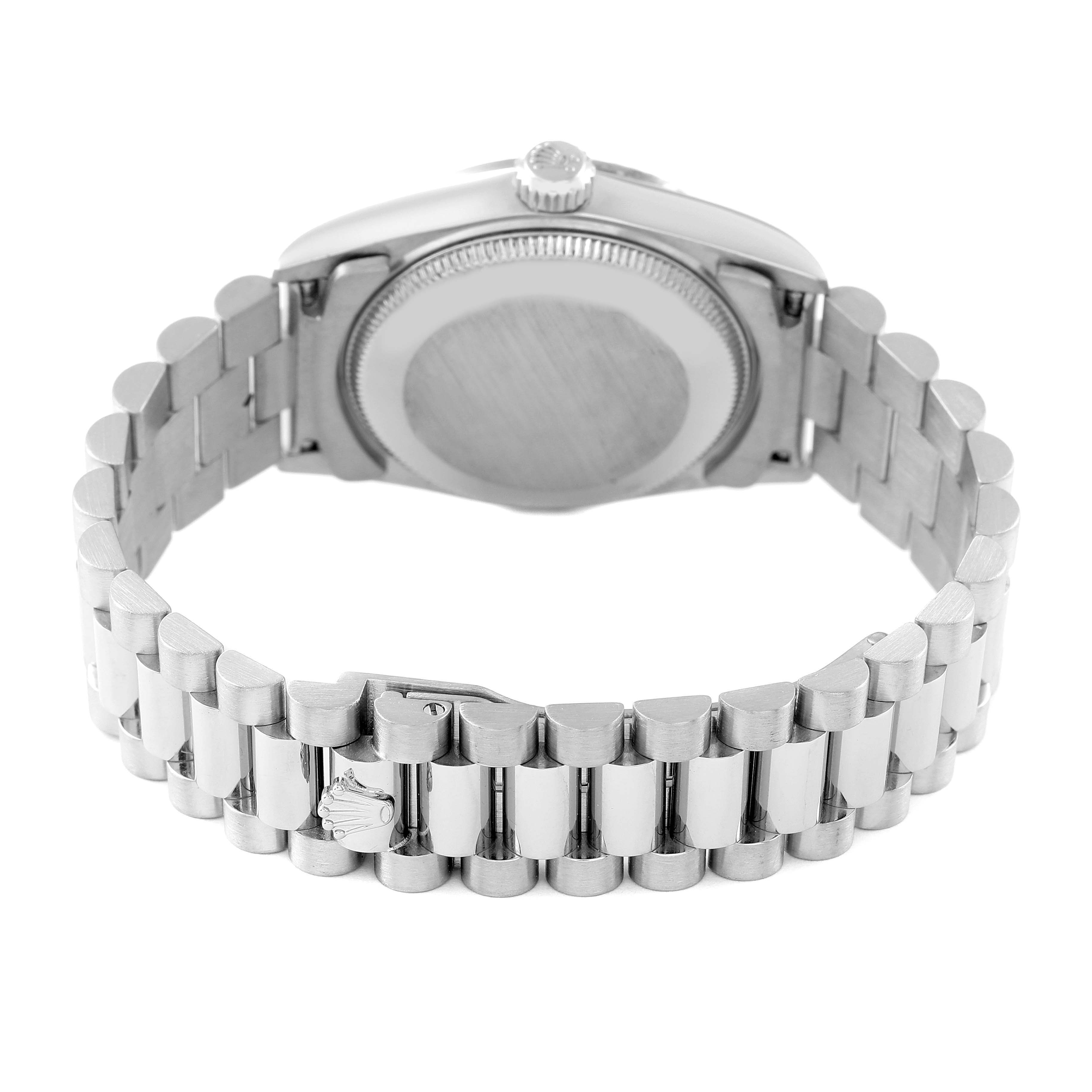 This image shows the backside and bracelet of a Rolex President 78279 Women's White Gold Blue Dial 78279 Women's White Gold Blue Dial model watch, focusing on the case back and links.