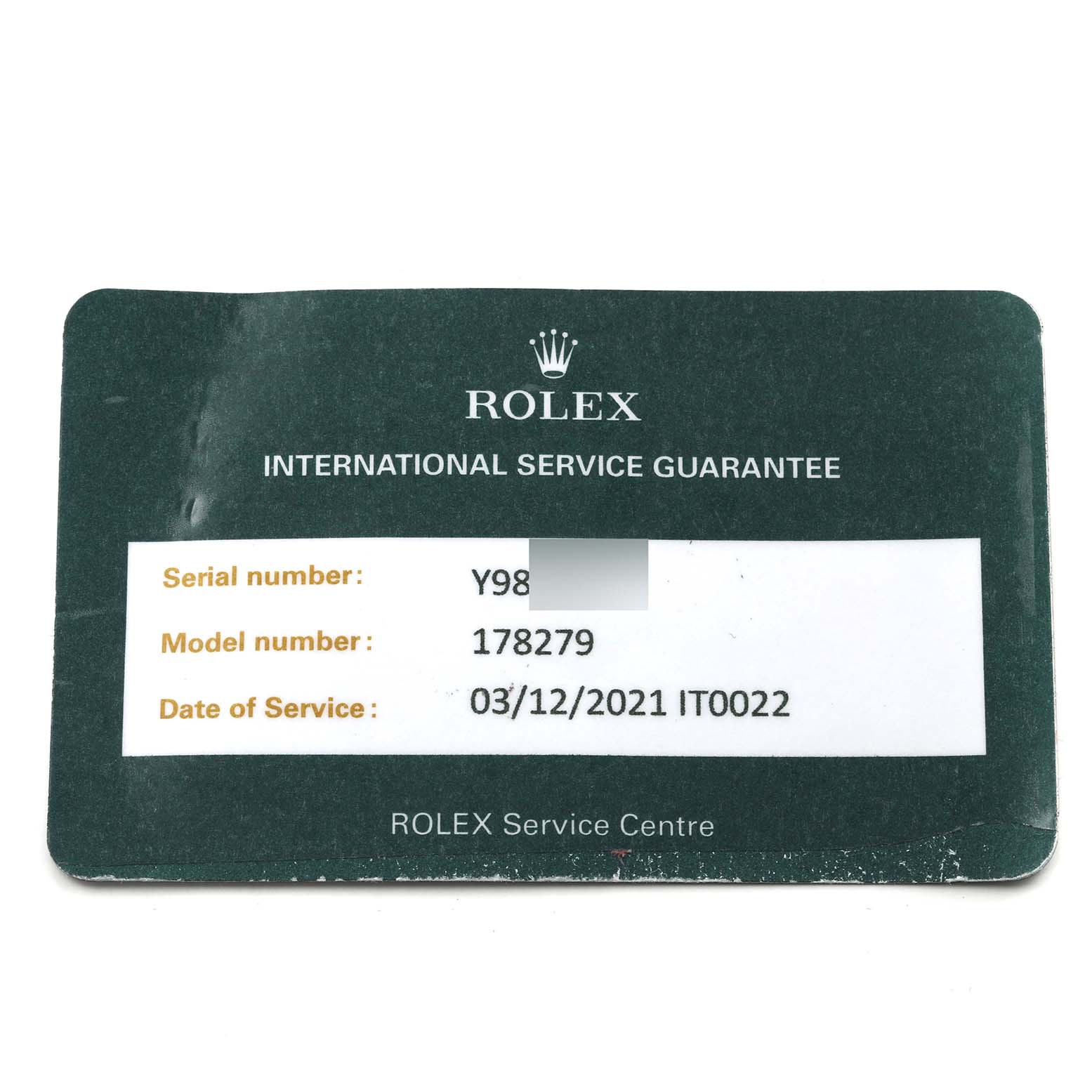 Image shows a Rolex International Service Guarantee card featuring a serial number, model number for the Rolex President 178279 Women's White Gold Mother of Pearl Dial 178279 Women's White Gold Mother of Pearl Dial, and service date.