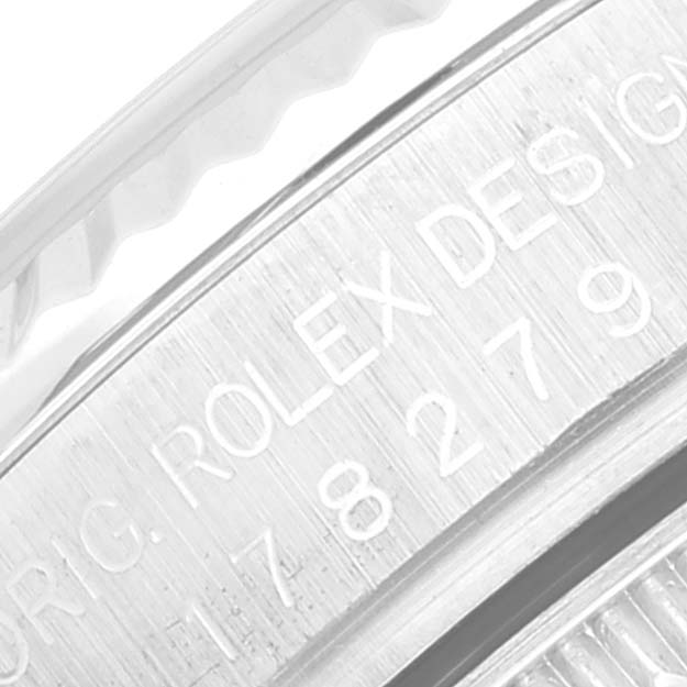 The image shows a close-up of the engraved side of the Rolex President 178279 Women's White Gold Mother of Pearl Dial 178279 Women's White Gold Mother of Pearl Dial model watch.