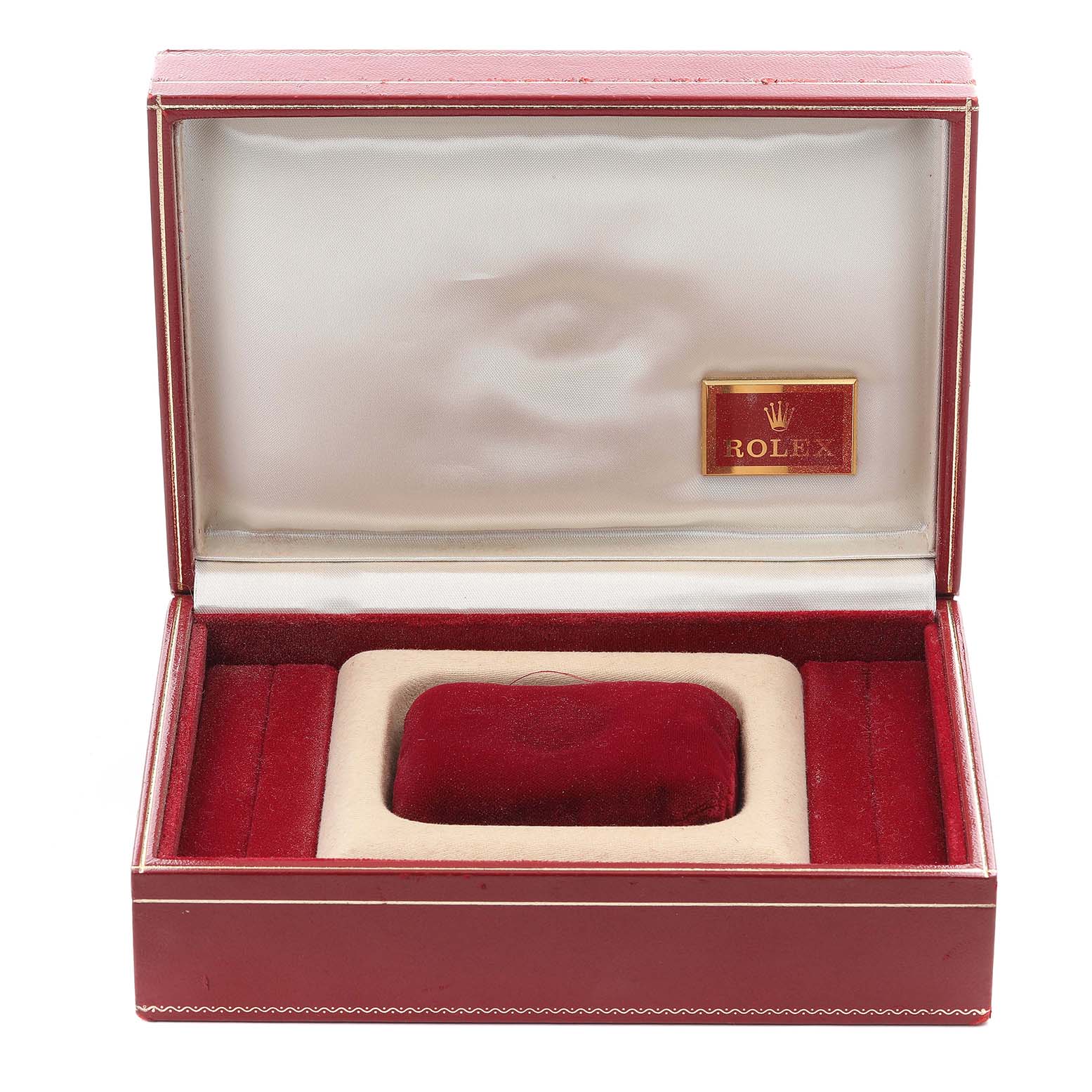 The image shows an empty open red Rolex President 69139 Women
s White Gold Champagne Dial 69139 Women
s White Gold Champagne Dial watch box from the front, showcasing its interior pillow and branding.