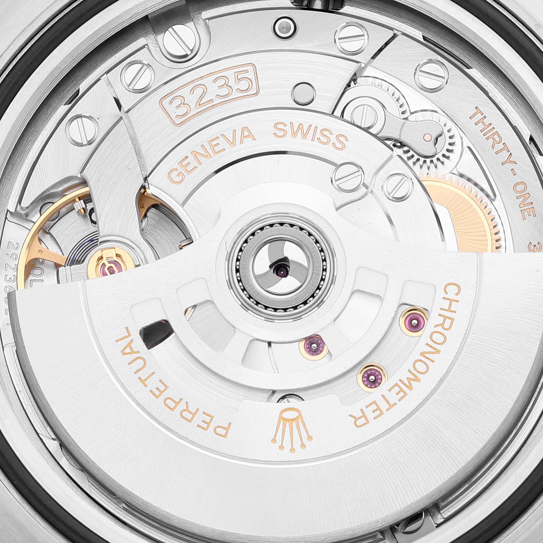 The image displays the intricate movement and mechanism of the Rolex Sea-Dweller 126603 Men's Steel and Gold (two tone) Black Dial 126603 Men's Steel and Gold (two tone) Black Dial's back, showcasing the automatic rotor and engraved components.