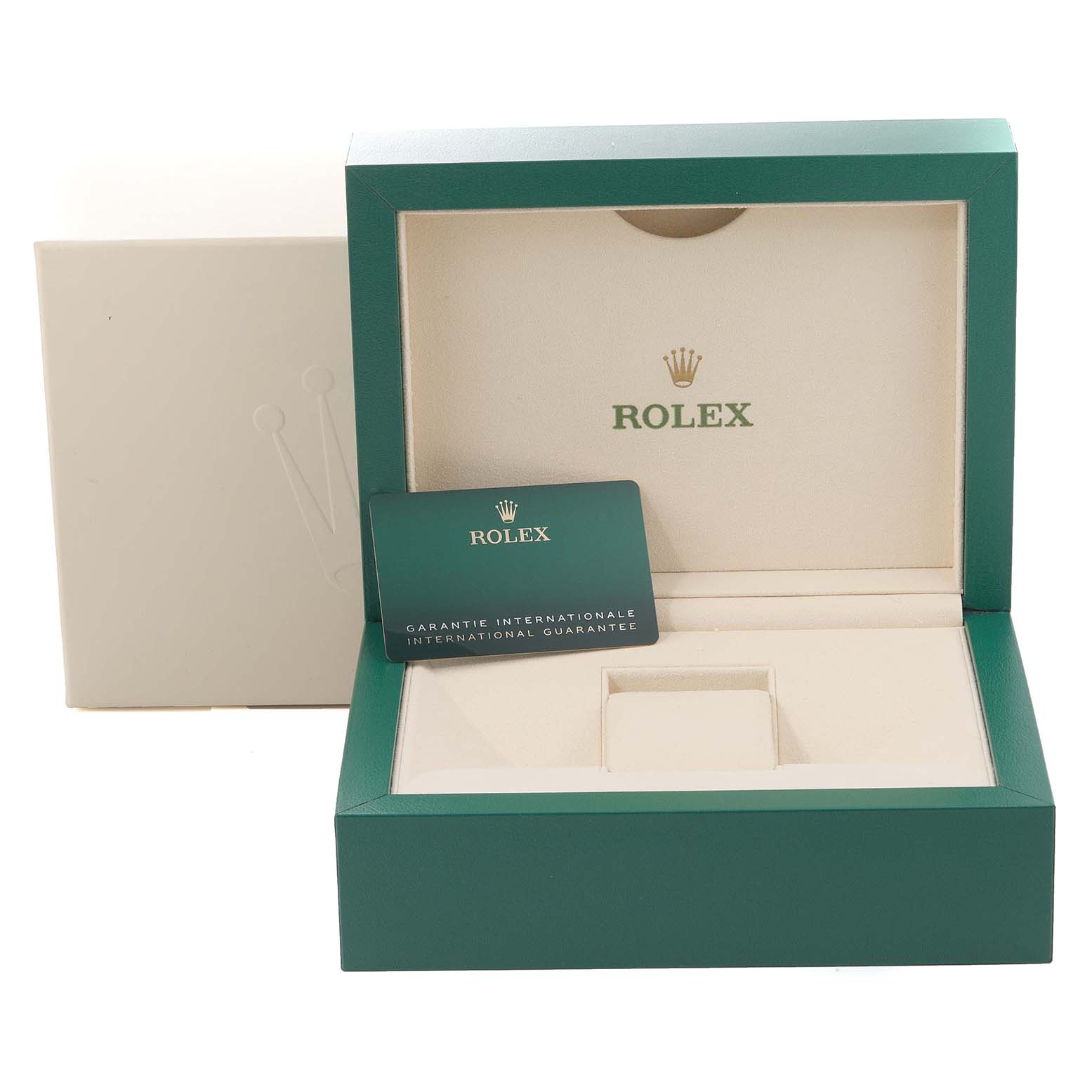 This image shows the open box for a Rolex Sea-Dweller 126603 Men's Steel and Gold (two tone) Black Dial 126603 Men's Steel and Gold (two tone) Black Dial watch along with the international guarantee card.