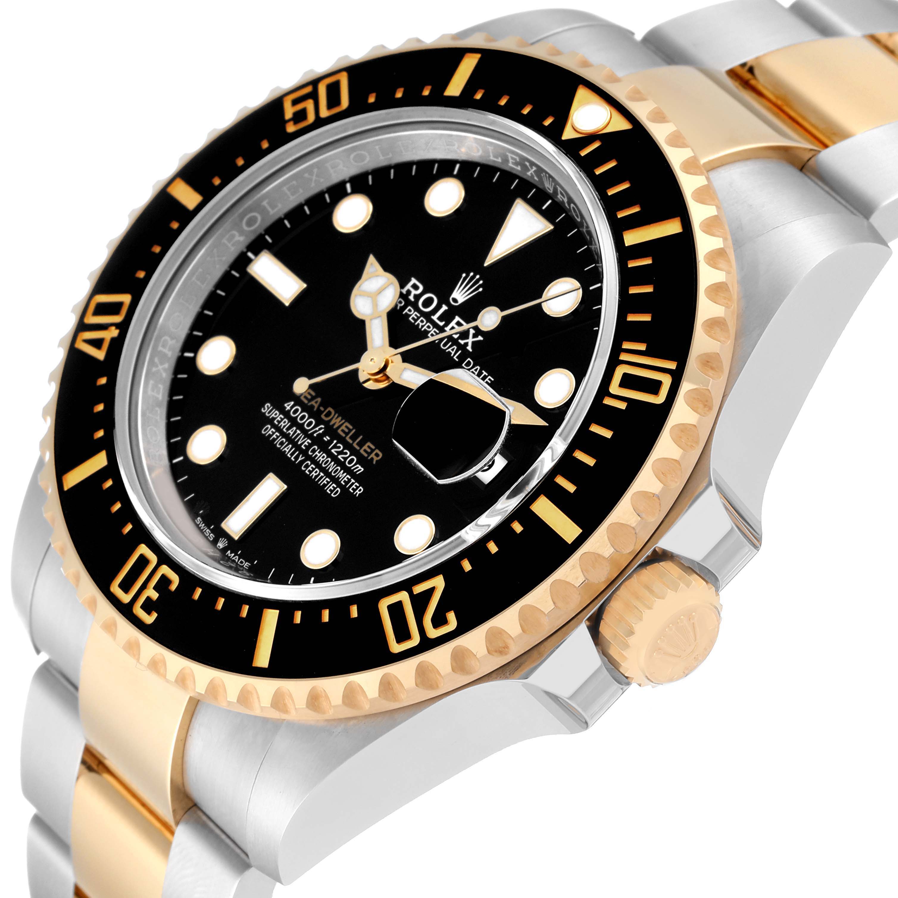 The Rolex Sea-Dweller 126603 Men's Steel and Gold (two tone) Black Dial 126603 Men's Steel and Gold (two tone) Black Dial watch is shown from an angled side view highlighting the dial, bezel, crown, and bracelet.