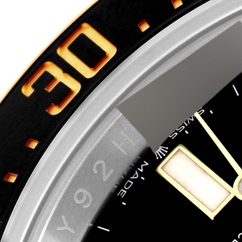 The image shows a close-up of the dial and bezel of the Rolex Sea-Dweller 126603 Men's Steel and Gold (two tone) Black Dial 126603 Men's Steel and Gold (two tone) Black Dial watch, with part of the minute marker and the "30" on the bezel visible.