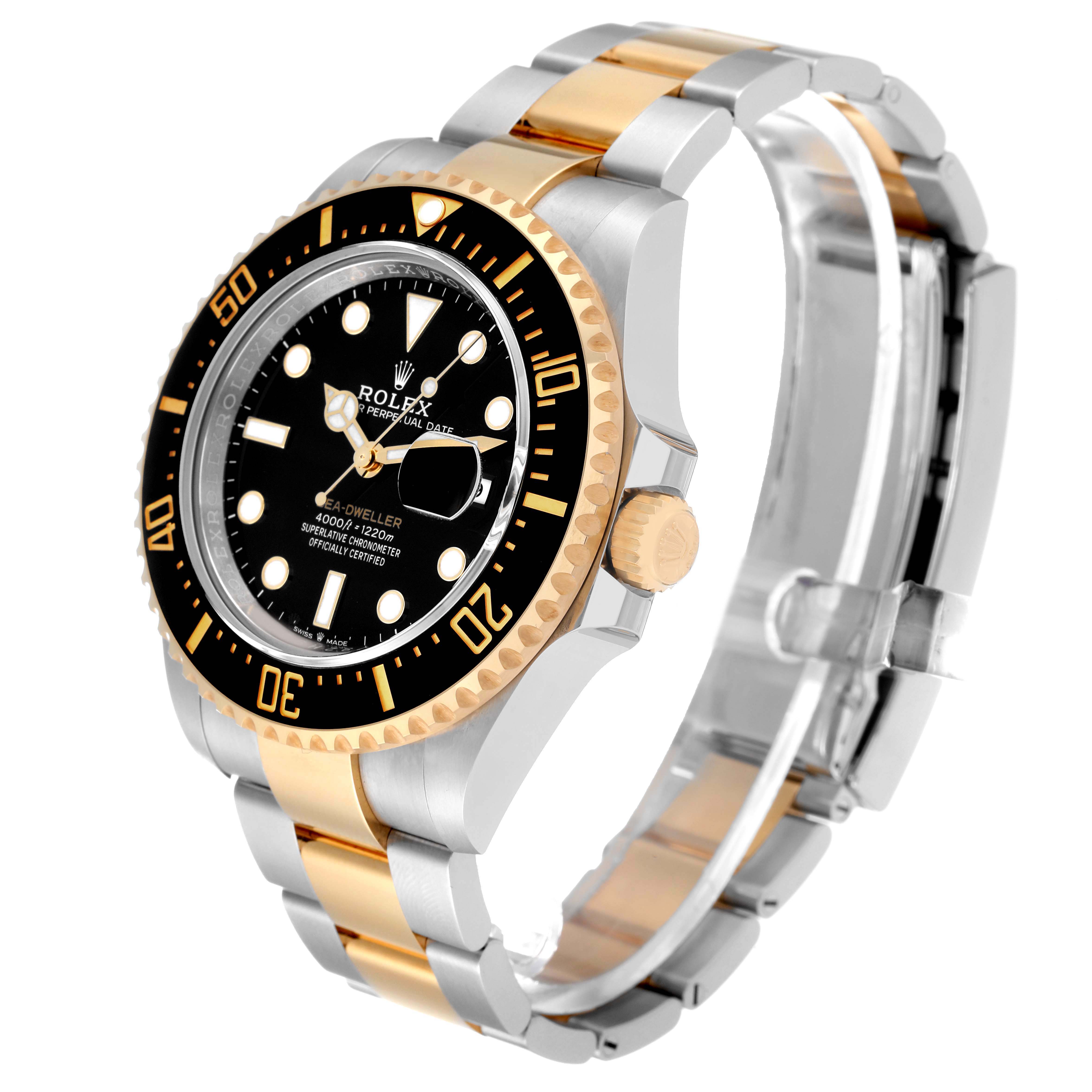 The image shows a side angle of the Rolex Sea-Dweller 126603 Men's Steel and Gold (two tone) Black Dial 126603 Men's Steel and Gold (two tone) Black Dial watch, highlighting its black bezel, gold crown, and two-tone bracelet.
