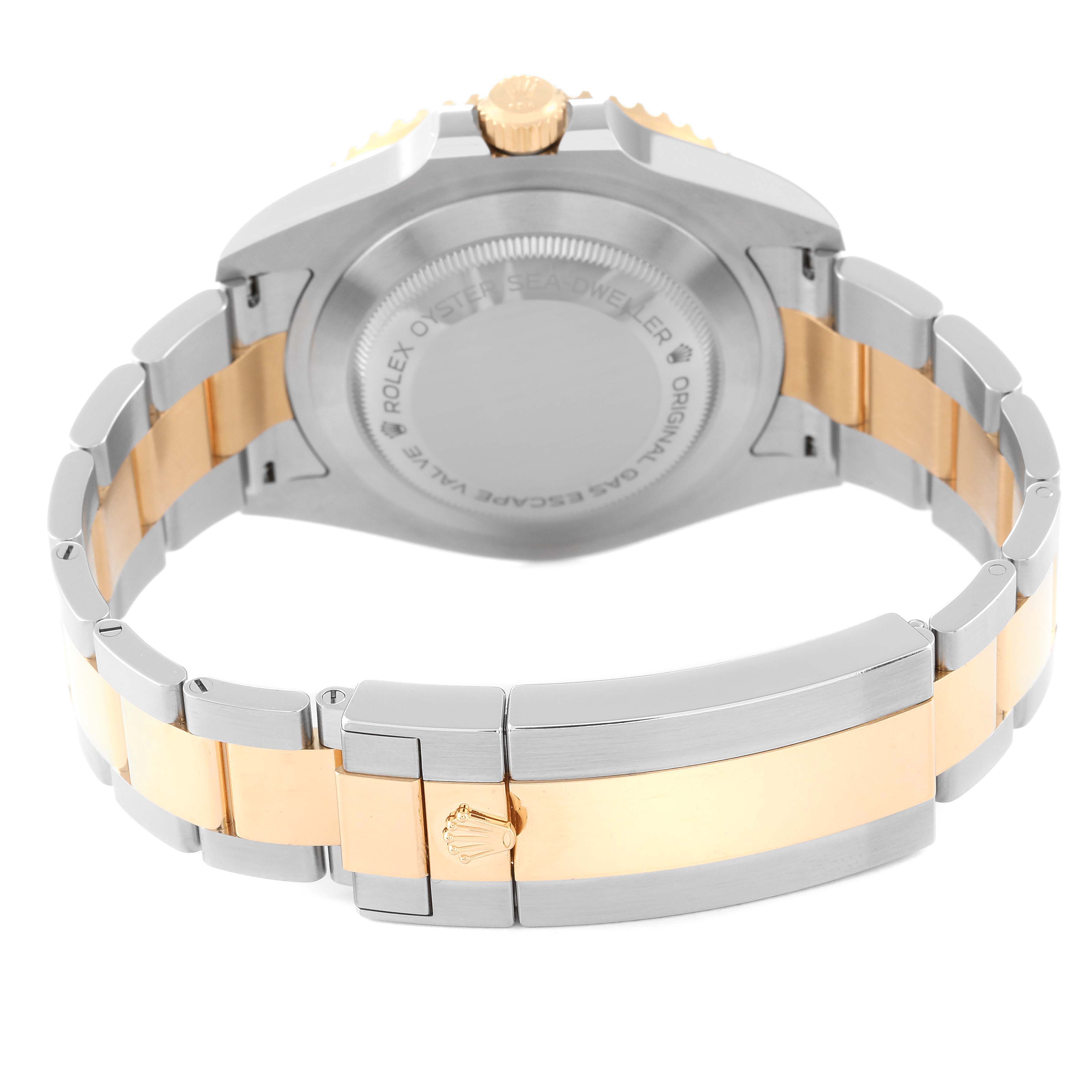 The image shows the back case and bracelet of a Rolex Sea-Dweller 126603 Men's Steel and Gold (two tone) Black Dial 126603 Men's Steel and Gold (two tone) Black Dial watch, focused on the clasp and case back.