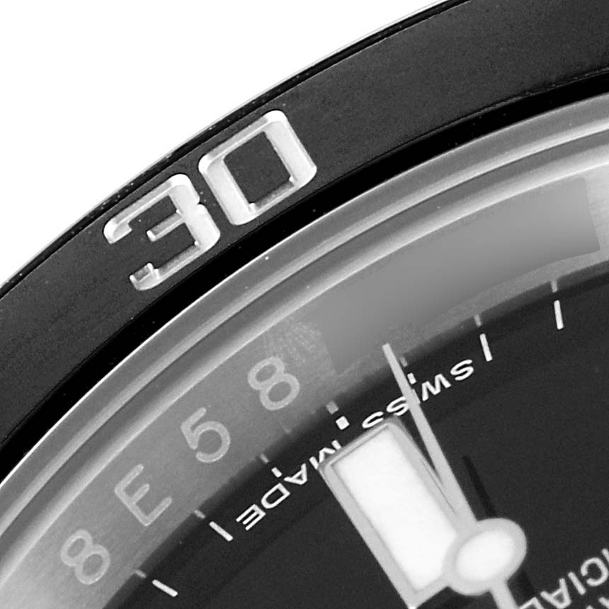 The image shows a close-up of the bezel and part of the dial of a Rolex Submariner 116610 Men
s Stainless Steel Black Dial 116610 Men
s Stainless Steel Black Dial watch.