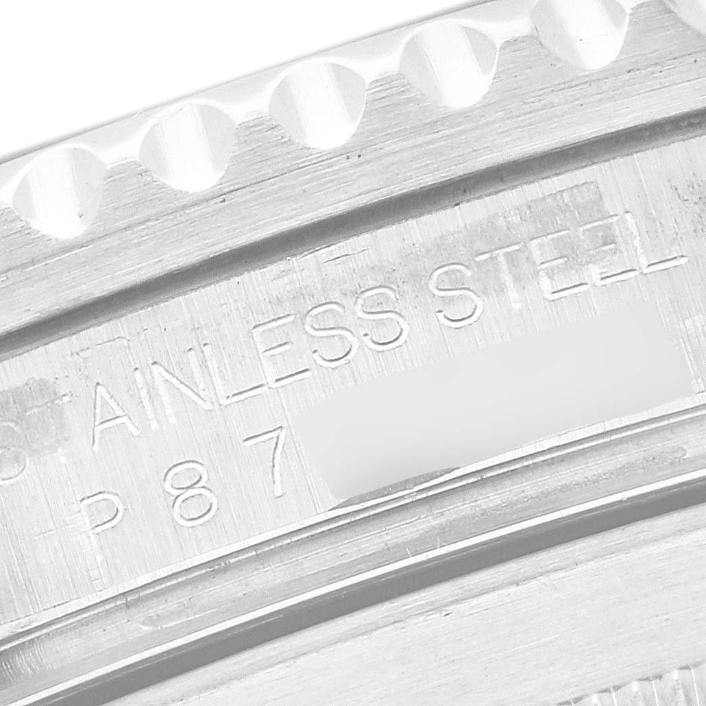 The image shows a close-up angle of the Rolex Submariner 16610 Men
s Stainless Steel Black Dial 16610 Men
s Stainless Steel Black Dial
s engraved stainless steel casing.