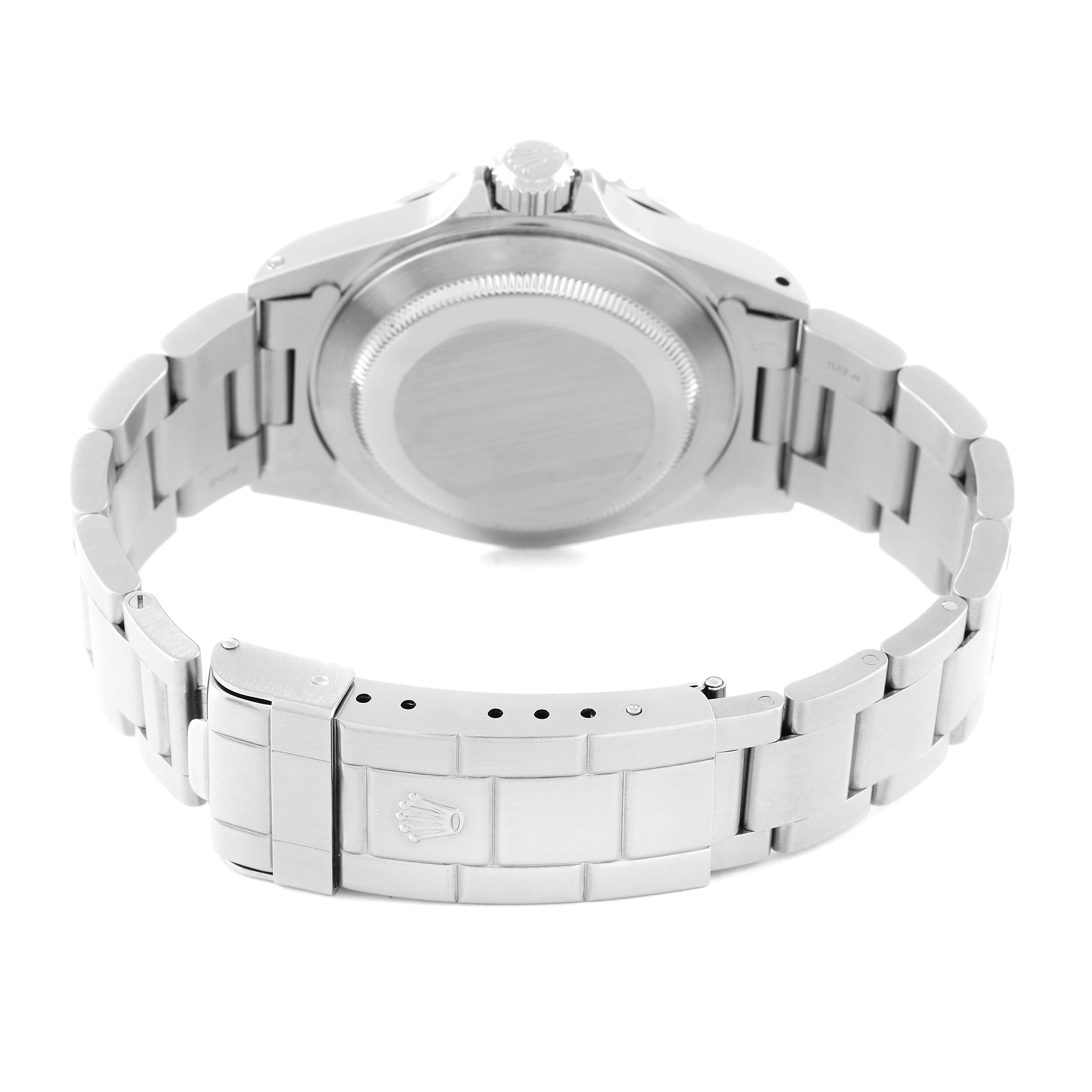 The image shows the back view of a Rolex Submariner 14060 Men
s Stainless Steel Black Dial 14060 Men
s Stainless Steel Black Dial watch, displaying its caseback and clasp.