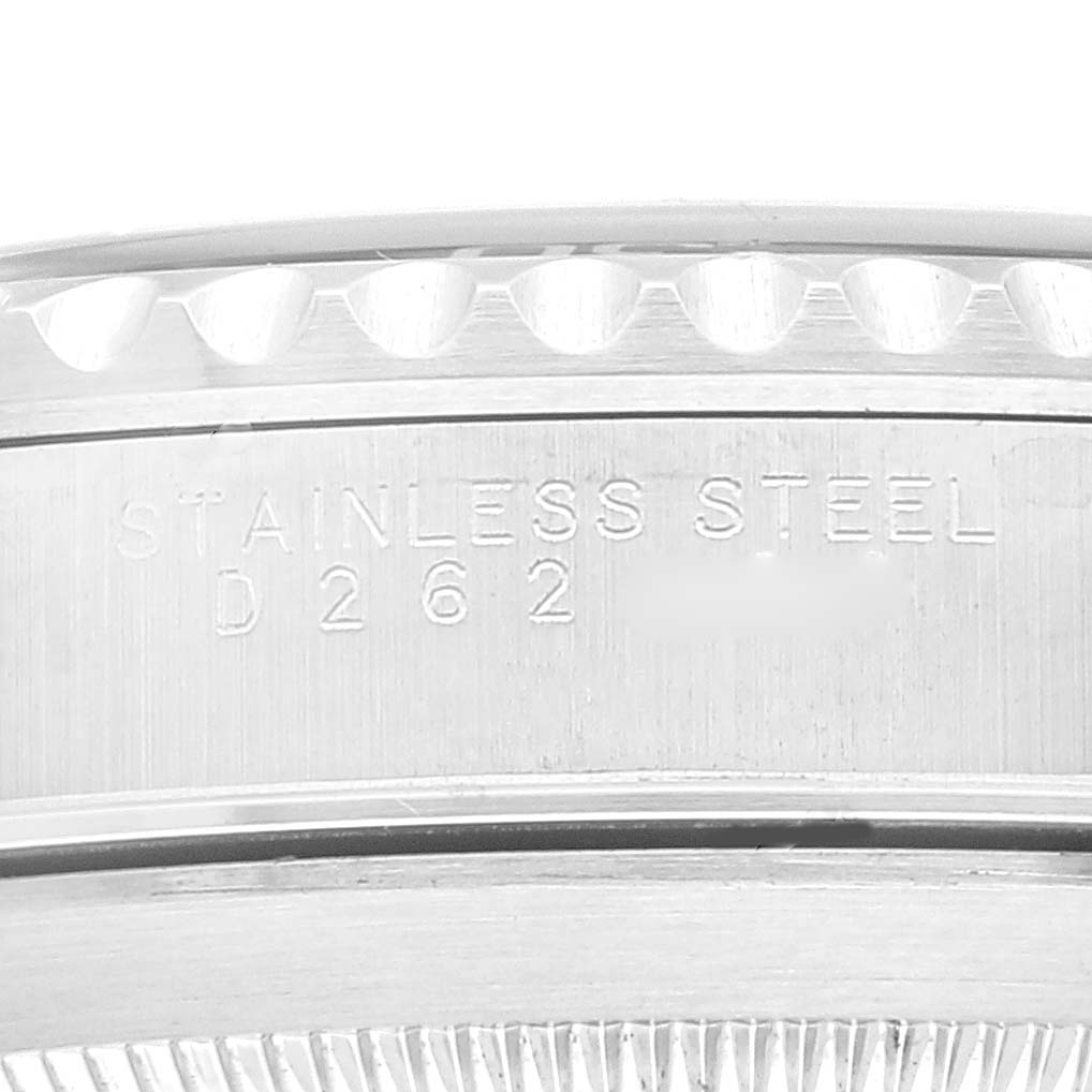 The image shows a close-up of the side engraving on a stainless steel Rolex Submariner 14060 Men
s Stainless Steel Black Dial 14060 Men
s Stainless Steel Black Dial bezel.