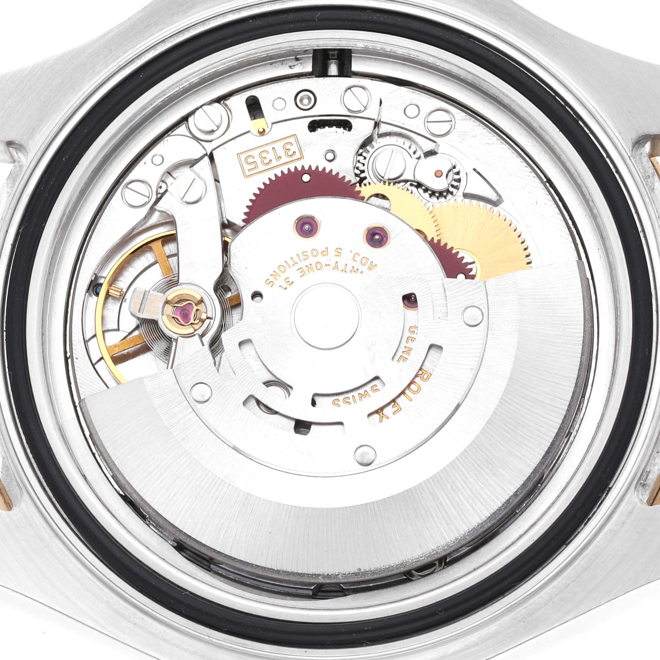This image shows the internal mechanism of a Rolex Yacht-Master 16623 Men
s Steel and Gold (two tone) Silver Dial 16623 Men
s Steel and Gold (two tone) Silver Dial watch from a rear view angle.