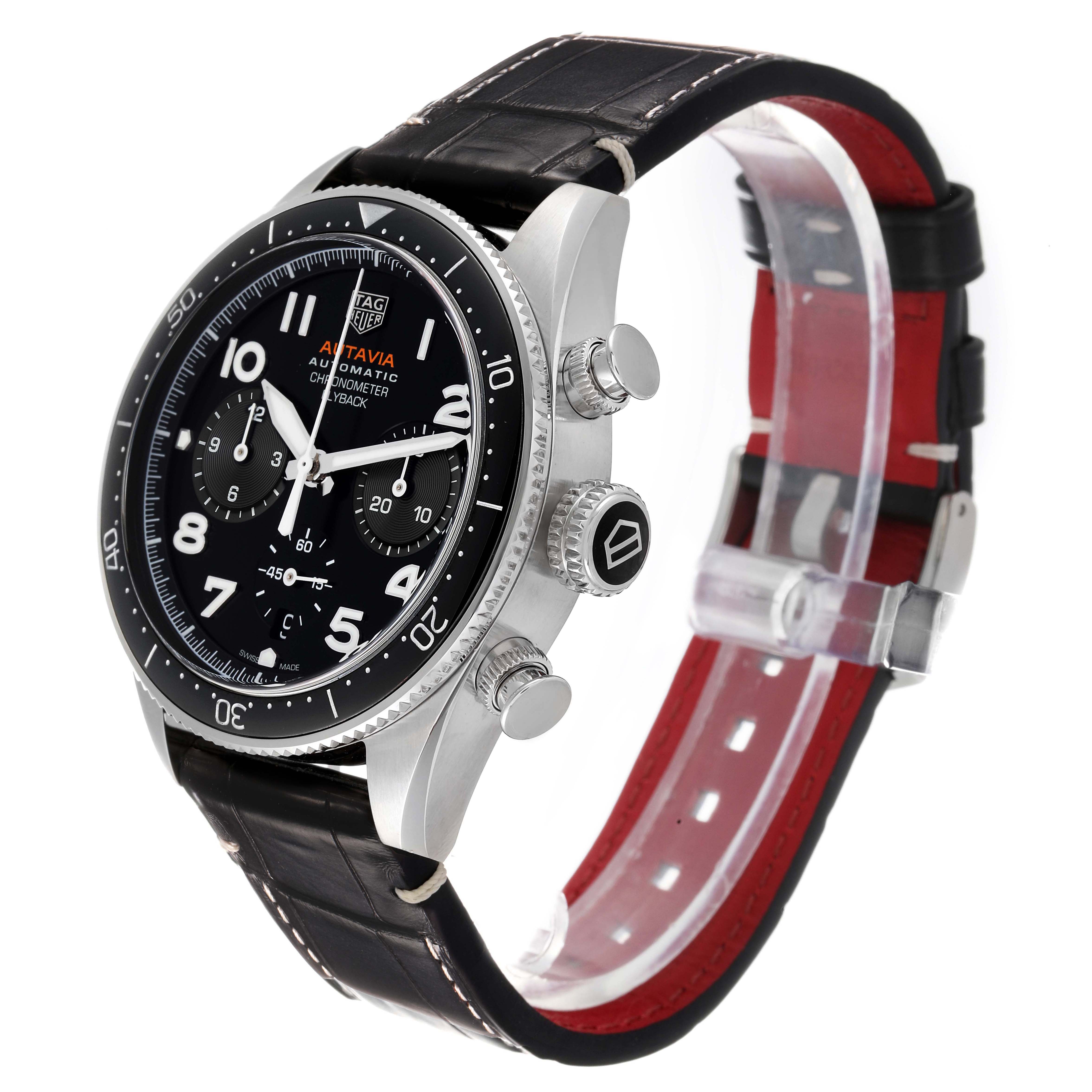 The Autavia by Tag Heuer is shown at an angled side view, highlighting the dial, bezel, crown, and leather strap.
