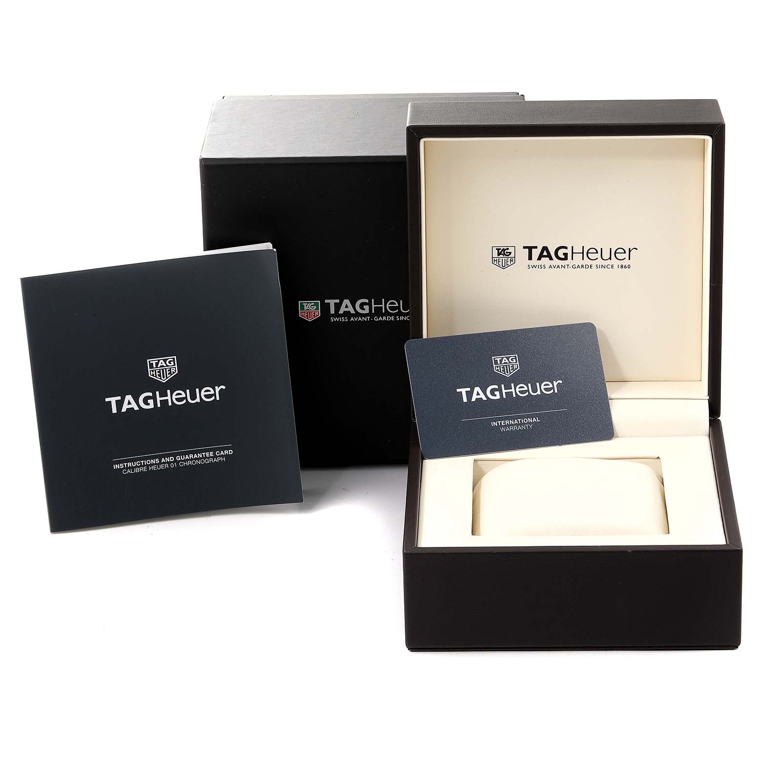 The image shows the packaging and accessories of the Tag Heuer Carrera CAR2A91.BH0742 Men's Ceramic Black Dial CAR2A91.BH0742 Men's Ceramic Black Dial watch, including the box, manual, and warranty card.