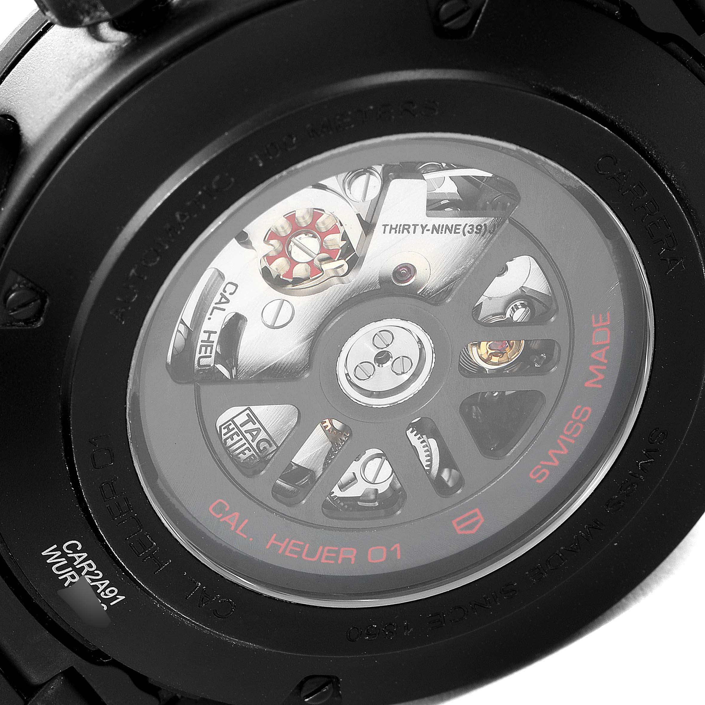 This image shows the case back of the Tag Heuer Carrera CAR2A91.BH0742 Men's Ceramic Black Dial CAR2A91.BH0742 Men's Ceramic Black Dial watch, revealing its mechanical movement and internal components.