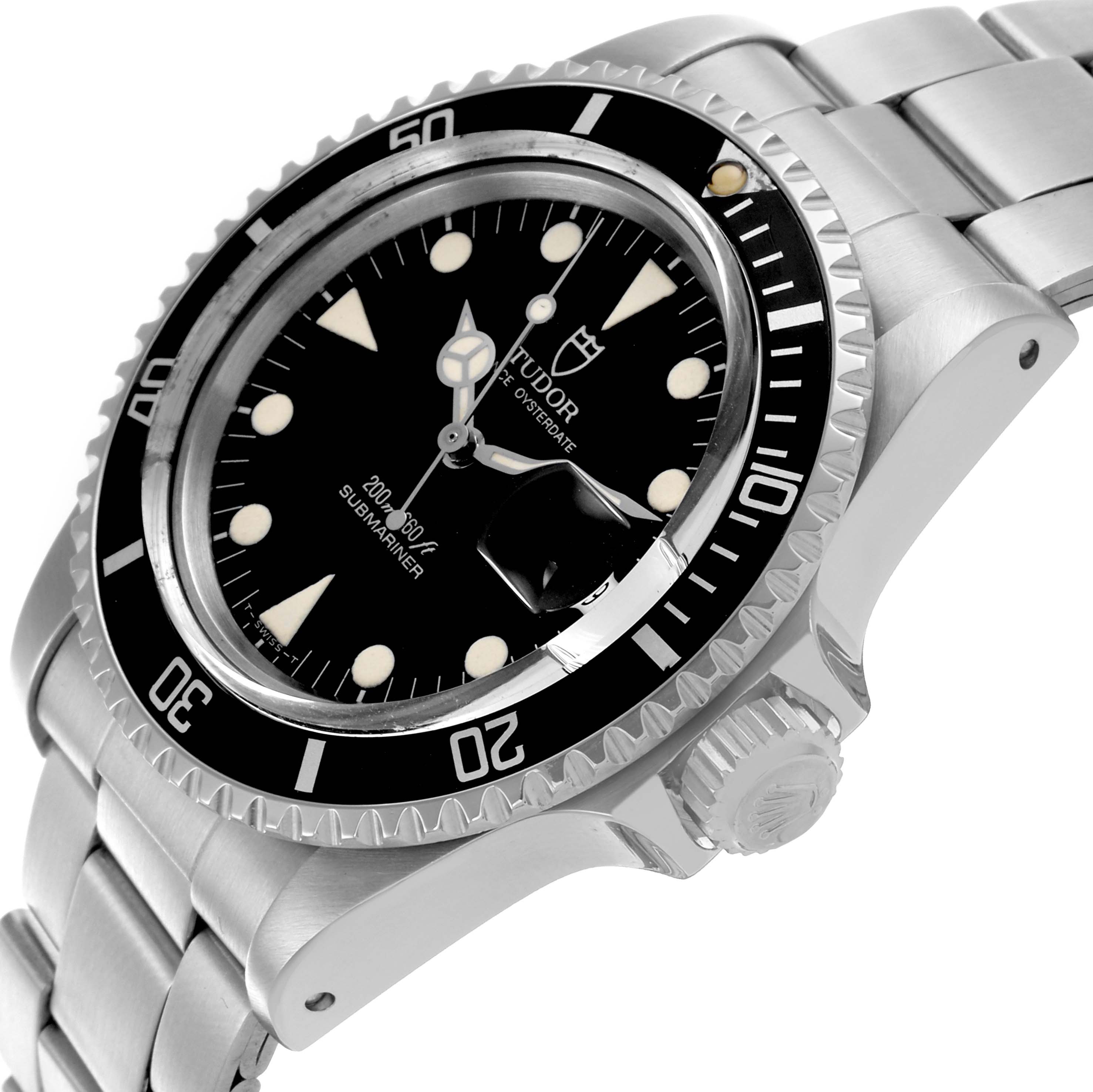 The Tudor Submariner 79090 Men's Stainless Steel Black Dial 79090 Men's Stainless Steel Black Dial watch is shown from an angled side view, highlighting the dial, bezel, crown, and bracelet.