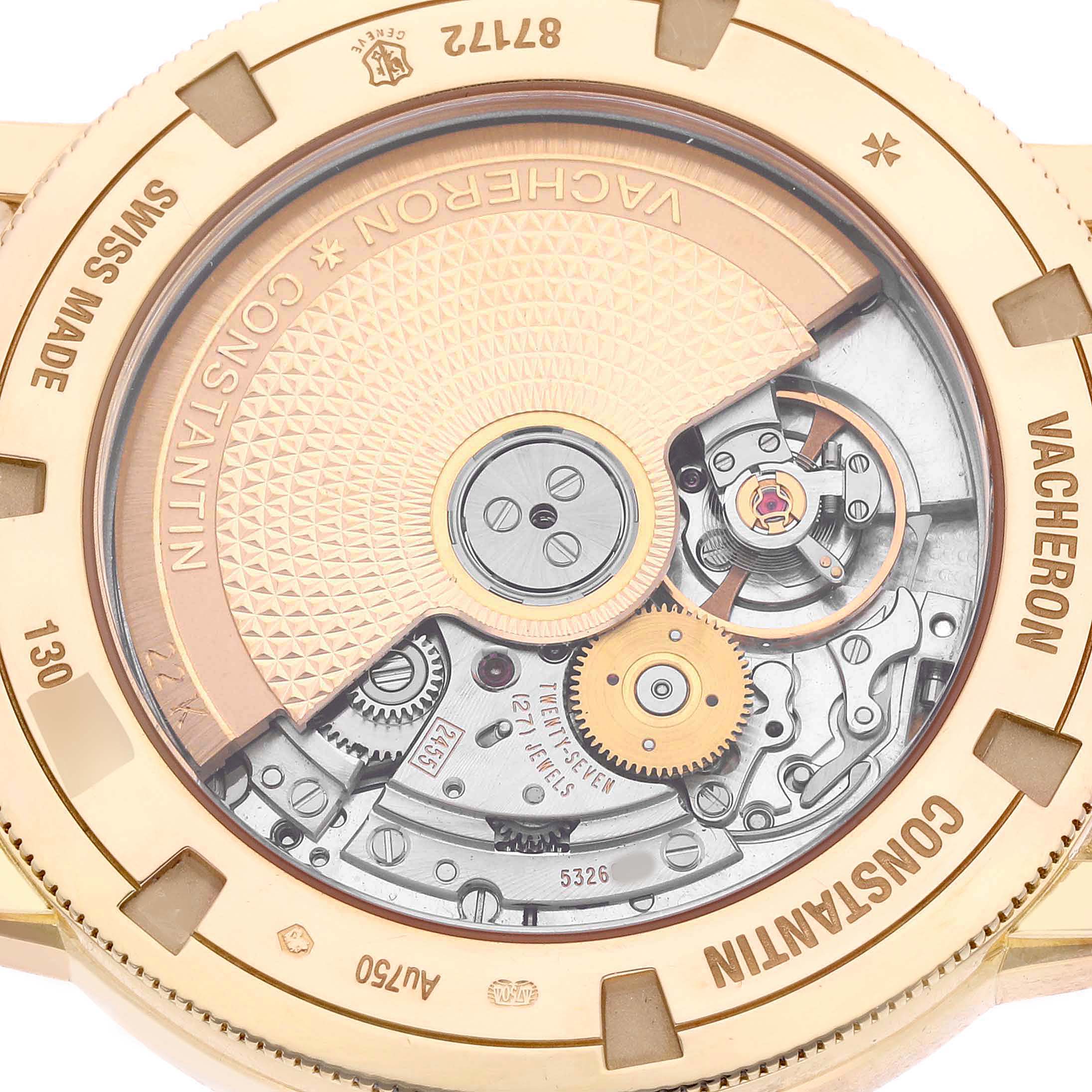 The image shows the open case back of a Vacheron Constantin Traditionnelle 87172/000J-9512 Men's Yellow Gold Silver Dial, revealing the intricate movement with gold and silver components.