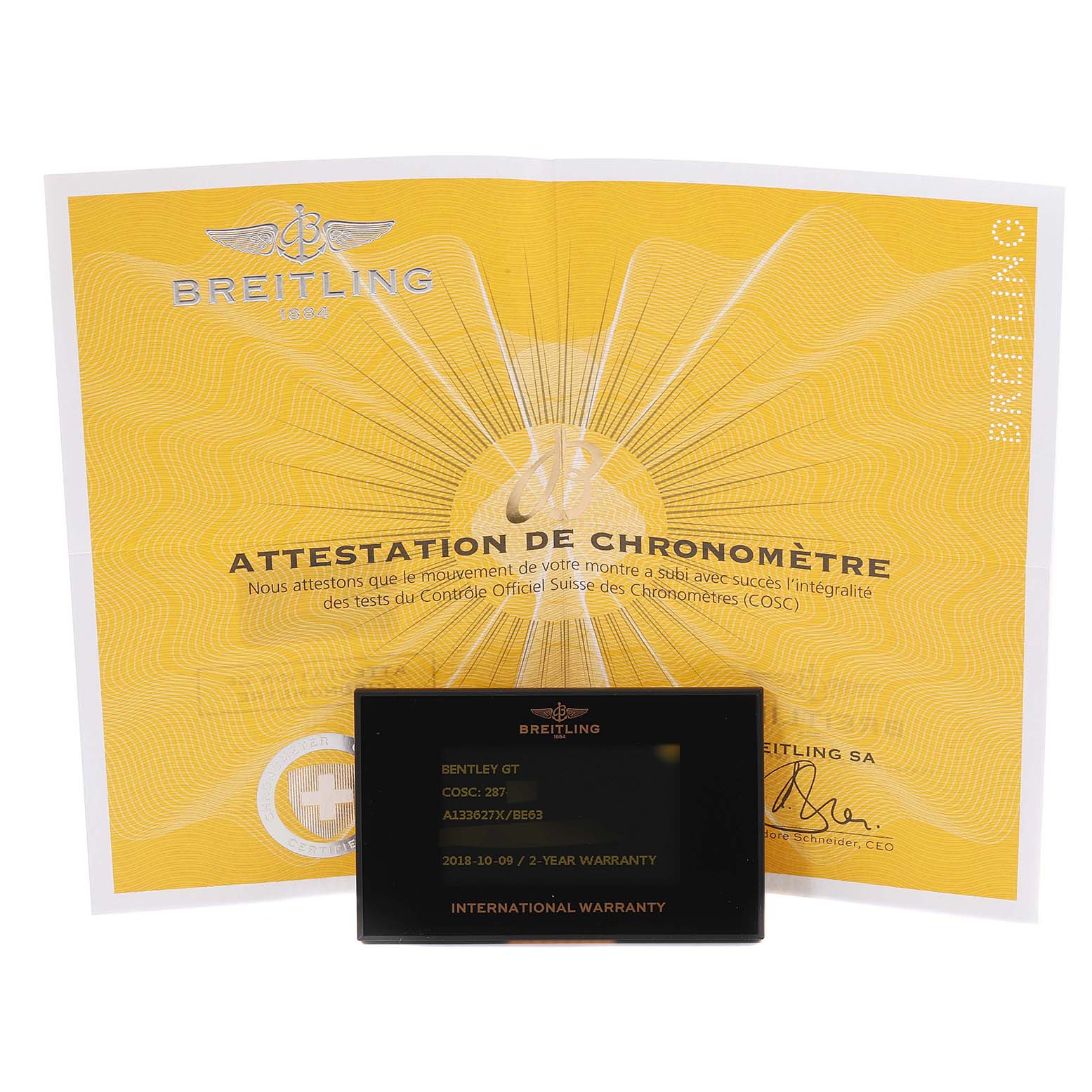 The image shows a Breitling Bentley A13362 Men's Stainless Steel Mother of Pearl Dial A13362 Men's Stainless Steel Mother of Pearl Dial GT certificate and an international warranty card.