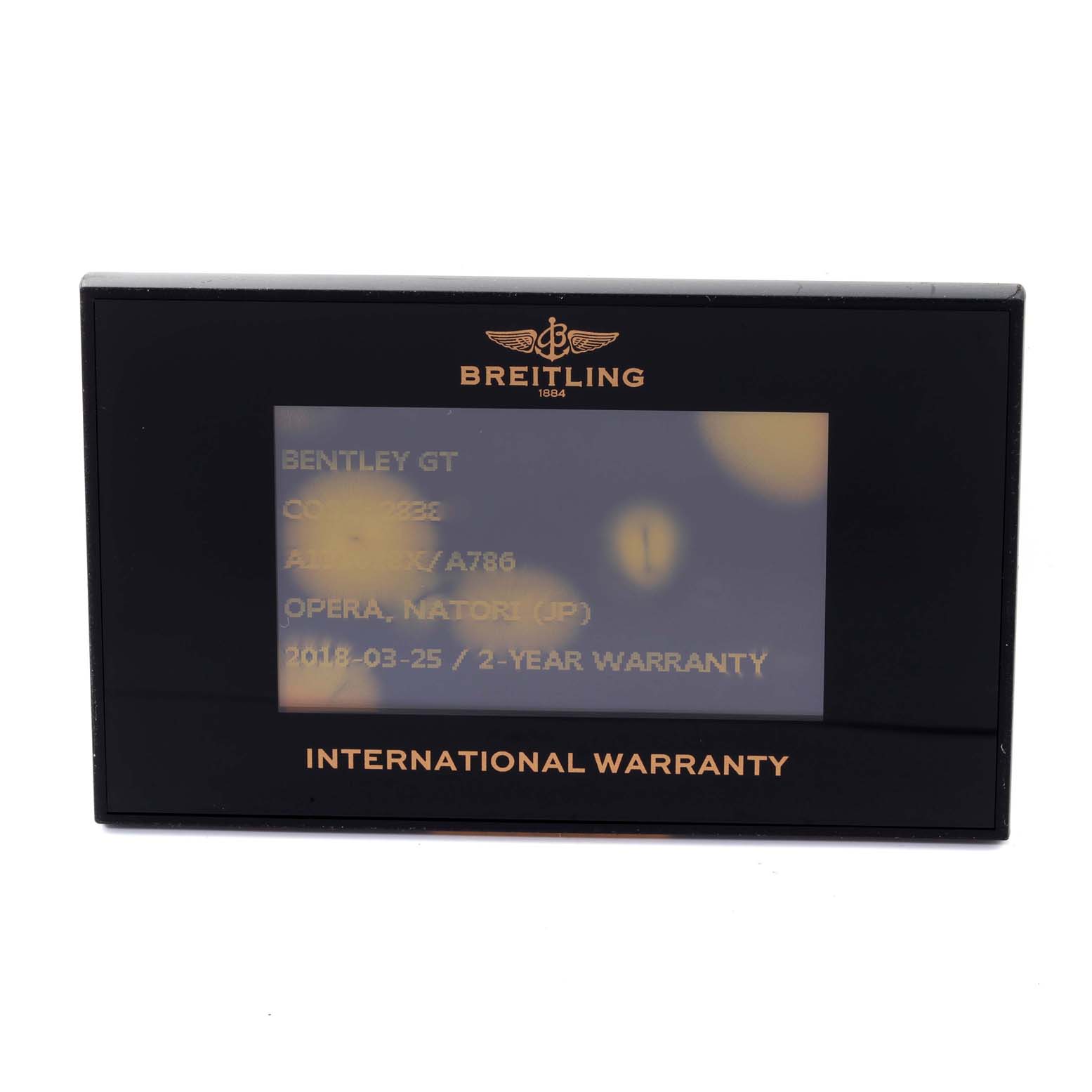 The image shows a Breitling Bentley A13362 Men's Stainless Steel Mother of Pearl Dial A13362 Men's Stainless Steel Mother of Pearl Dial model warranty card from a front angle.