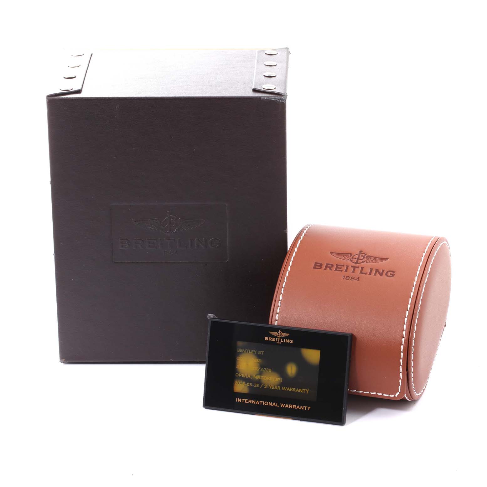 This image shows the packaging and warranty card for a Breitling Bentley A13362 Men's Stainless Steel Mother of Pearl Dial A13362 Men's Stainless Steel Mother of Pearl Dial model watch.