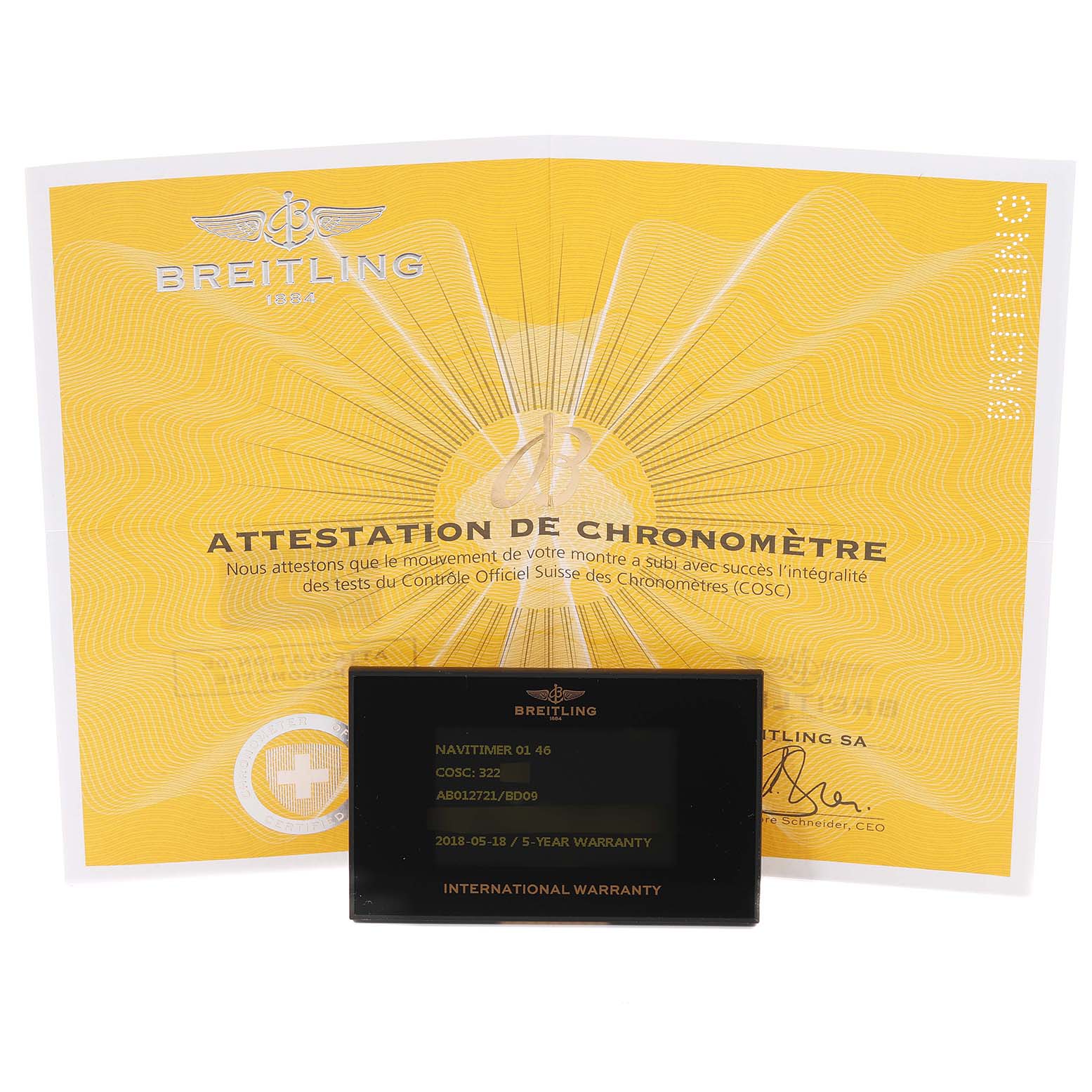The image shows the certification and the warranty card for a Breitling Navitimer AB0127-211-B1A1 Men
s Stainless Steel Black Dial AB0127-211-B1A1 Men
s Stainless Steel Black Dial watch, displayed from a frontal angle.
