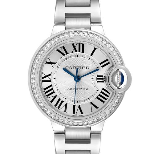 The Cartier Ballon Bleu watch is shown from a front view, highlighting the face, Roman numerals, and diamond bezel.