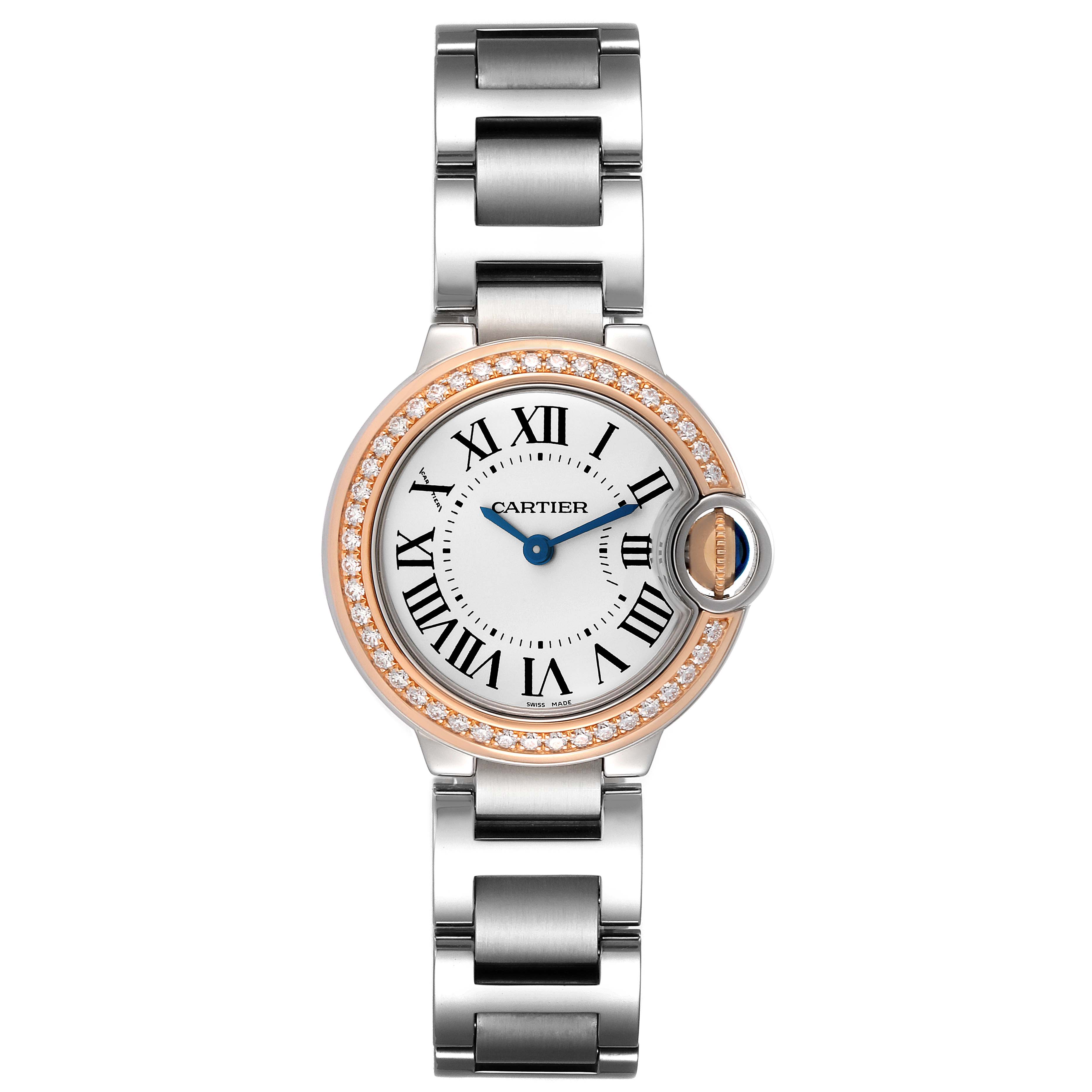 The image shows a Cartier Ballon Bleu WE902079 Women's Steel and Gold (two tone) Silver Dial WE902079 Women's Steel and Gold (two tone) Silver Dial watch from a top-down angle, highlighting its face, bezel, and bracelet.