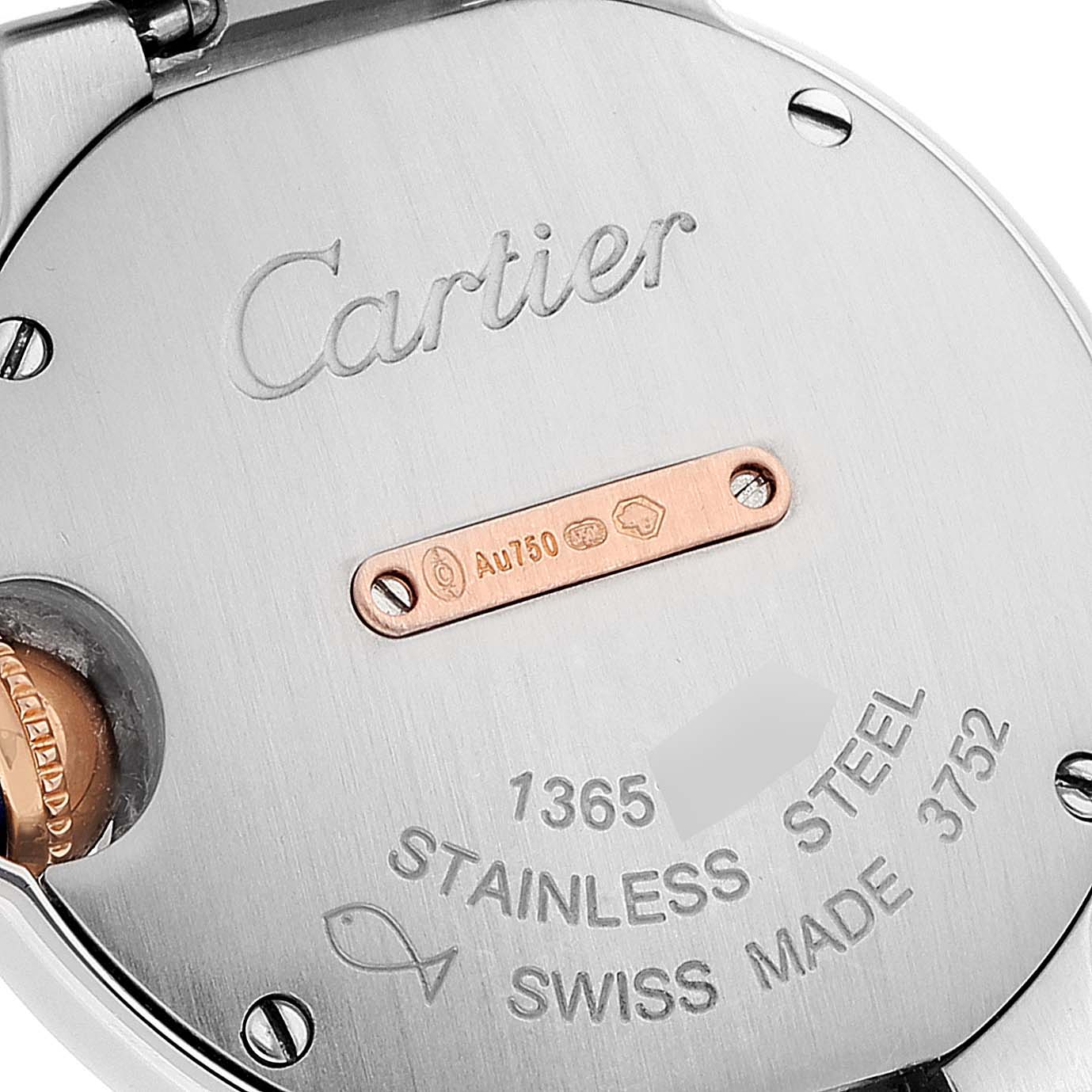 The image shows the back of the Cartier Ballon Bleu WE902079 Women's Steel and Gold (two tone) Silver Dial WE902079 Women's Steel and Gold (two tone) Silver Dial watch, highlighting the model number, material details, and engravings.