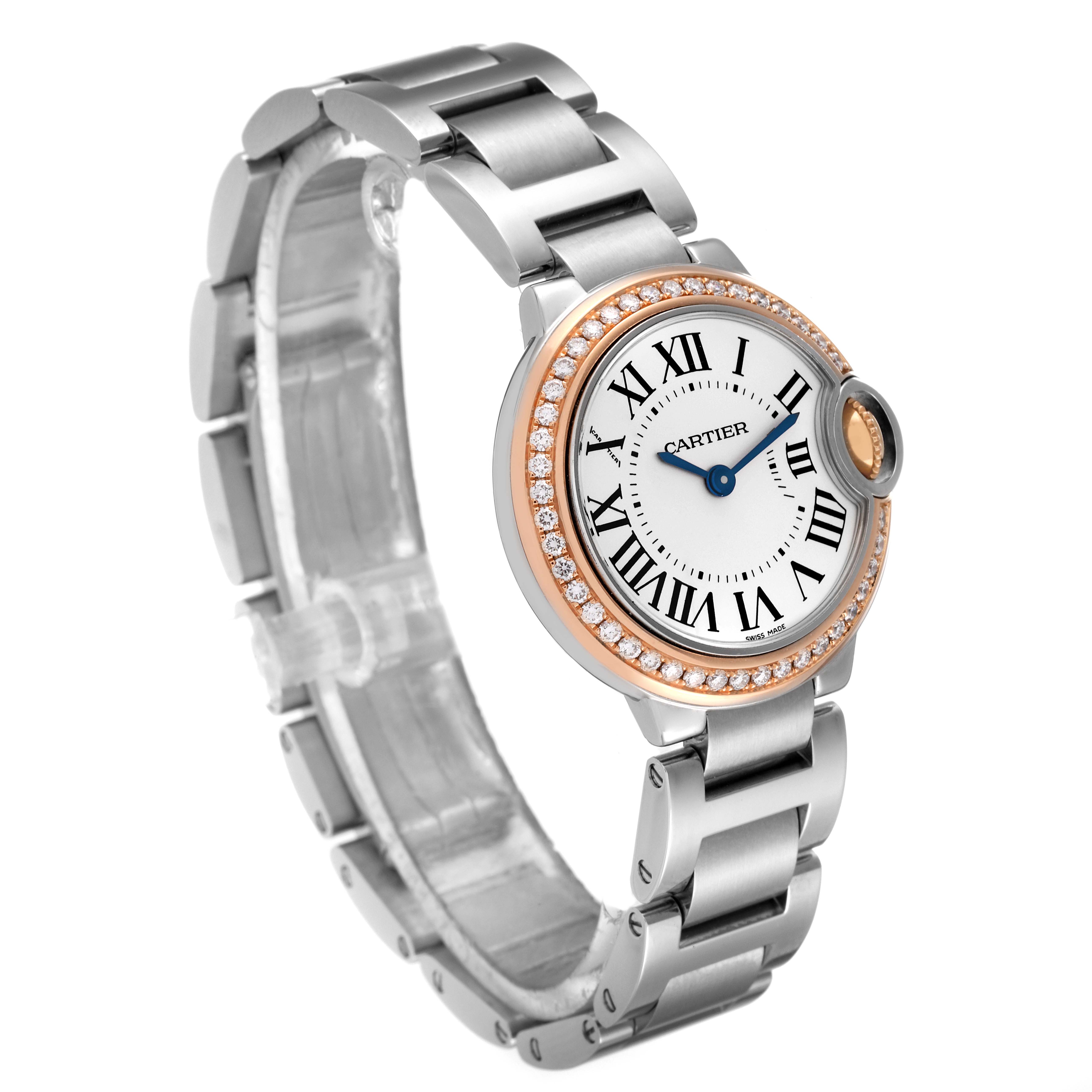 The image shows a side angle of a Ballon Bleu de Cartier watch, highlighting its face, bezel, and metal bracelet.