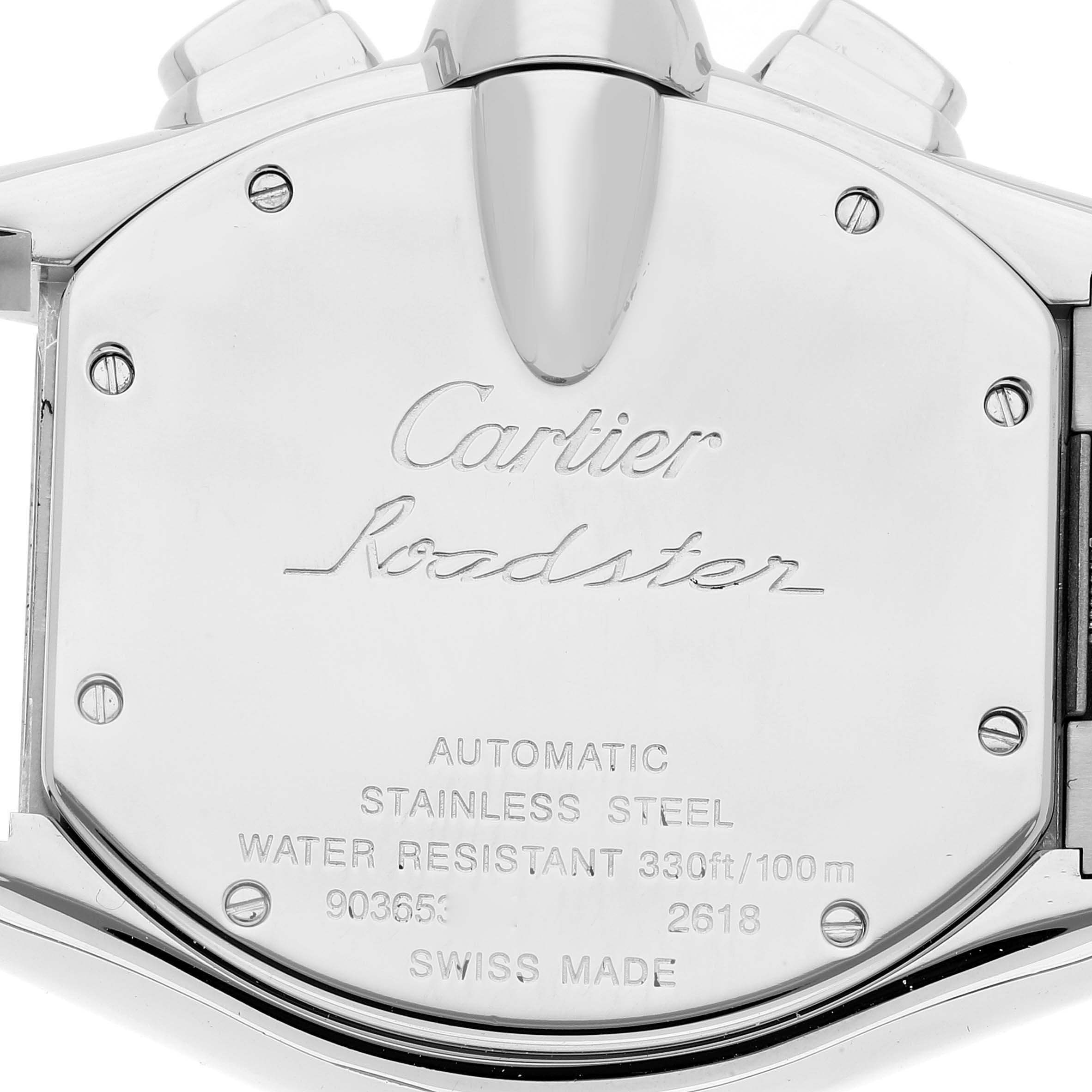 This image shows the back case of the Cartier Roadster W62020X6 Men's Stainless Steel Black Dial W62020X6 Men's Stainless Steel Black Dial watch, including engraved markings and screws.