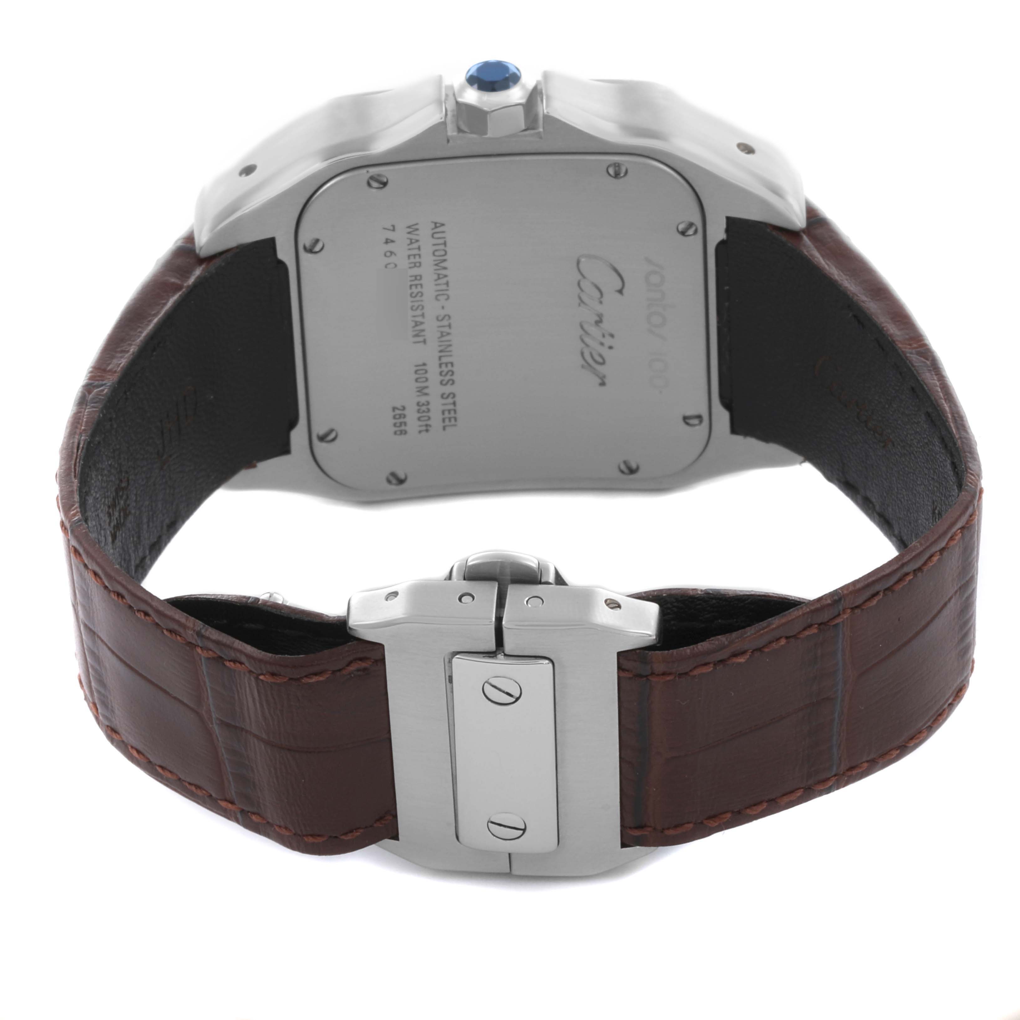 The image shows the back of the Cartier Santos W20073X8 Men
s Stainless Steel Silver Dial W20073X8 Men
s Stainless Steel Silver Dial watch, highlighting its case back, leather strap, and clasp.
