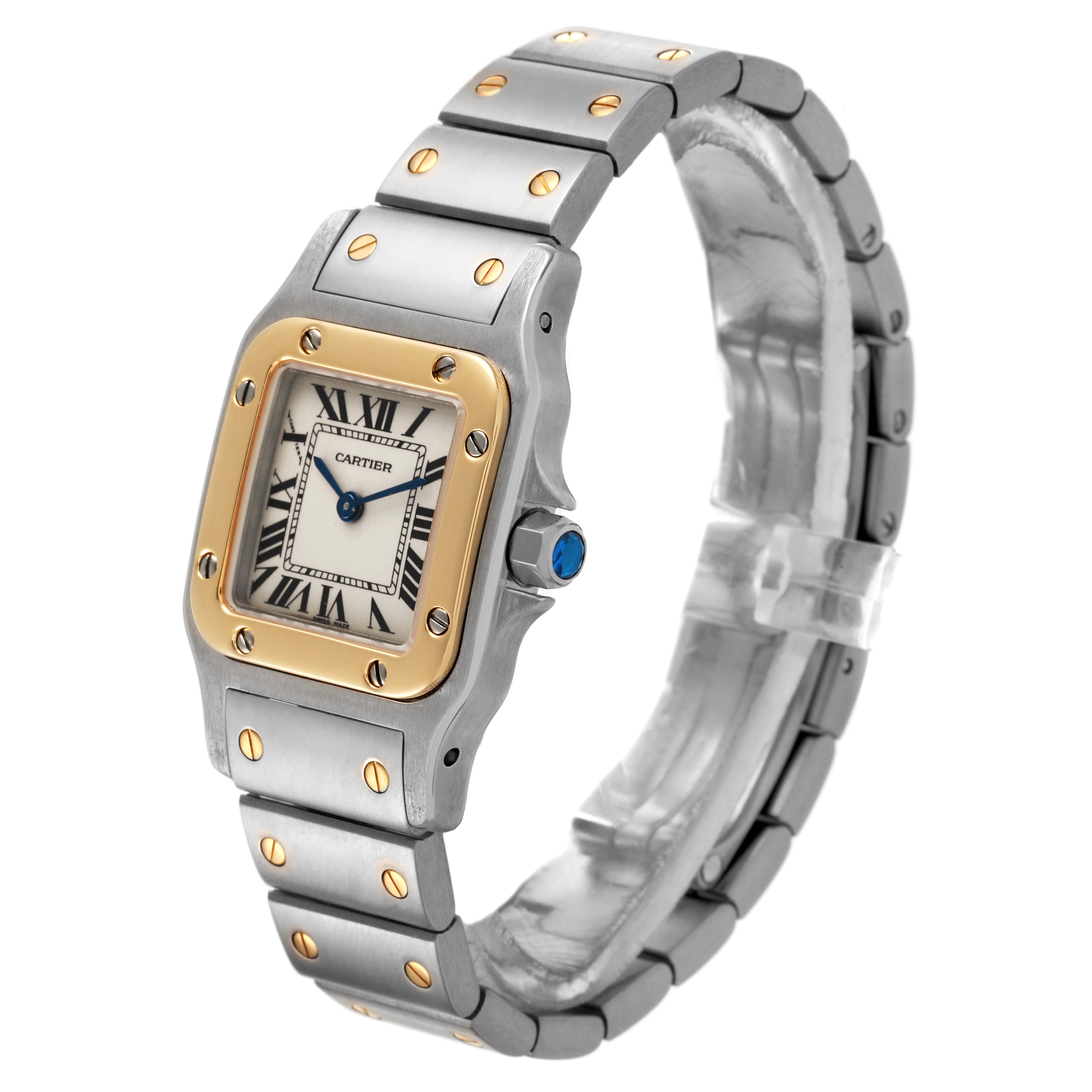 The Cartier Santos W20012C4 Women's Steel and Gold (two tone) Silver Dial W20012C4 Women's Steel and Gold (two tone) Silver Dial watch is shown at a slight angle, highlighting the face, bezel, crown, and metal bracelet.
