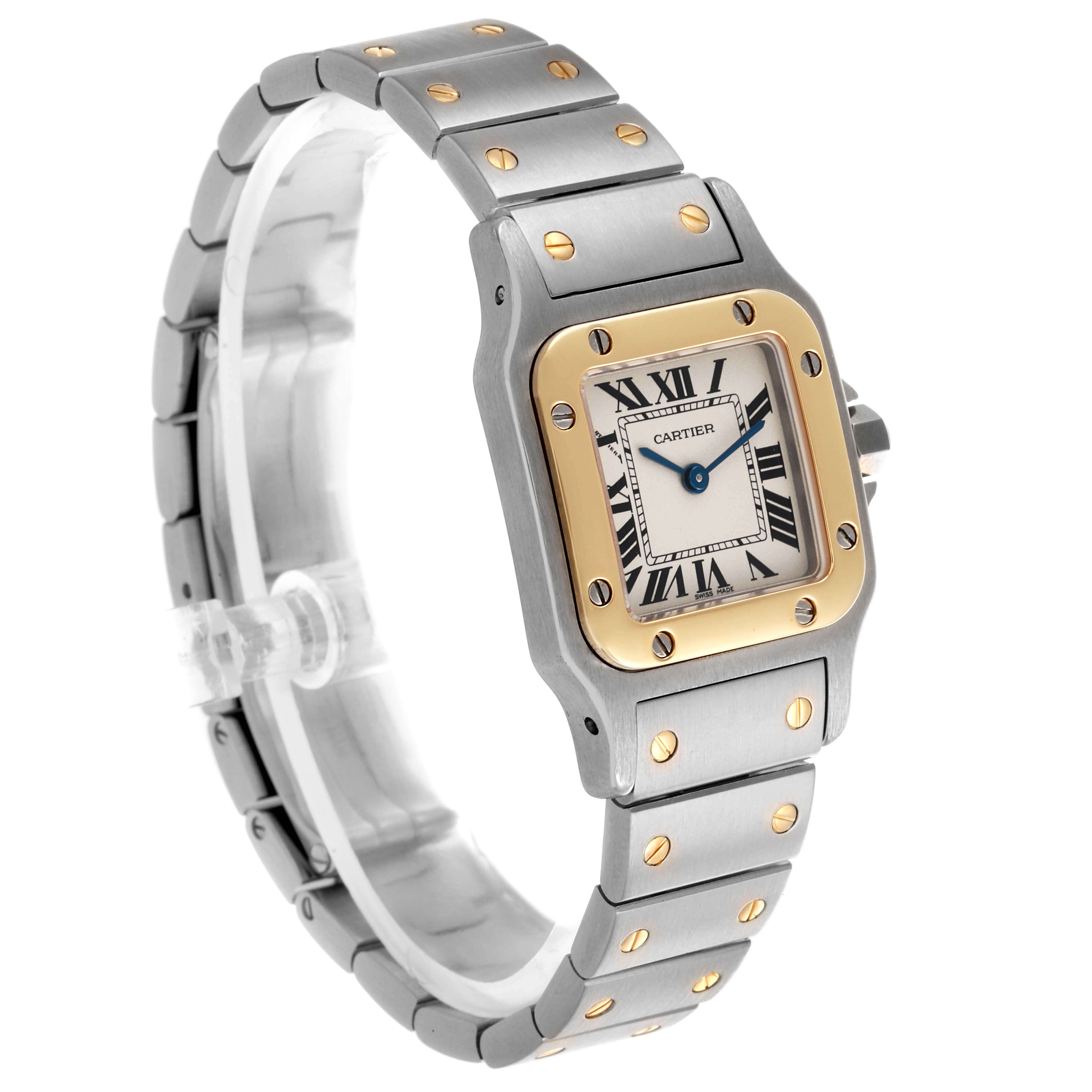 The Cartier Santos W20012C4 Women's Steel and Gold (two tone) Silver Dial W20012C4 Women's Steel and Gold (two tone) Silver Dial watch is shown at a three-quarter angle, highlighting its bracelet, bezel, and Roman numeral dial.
