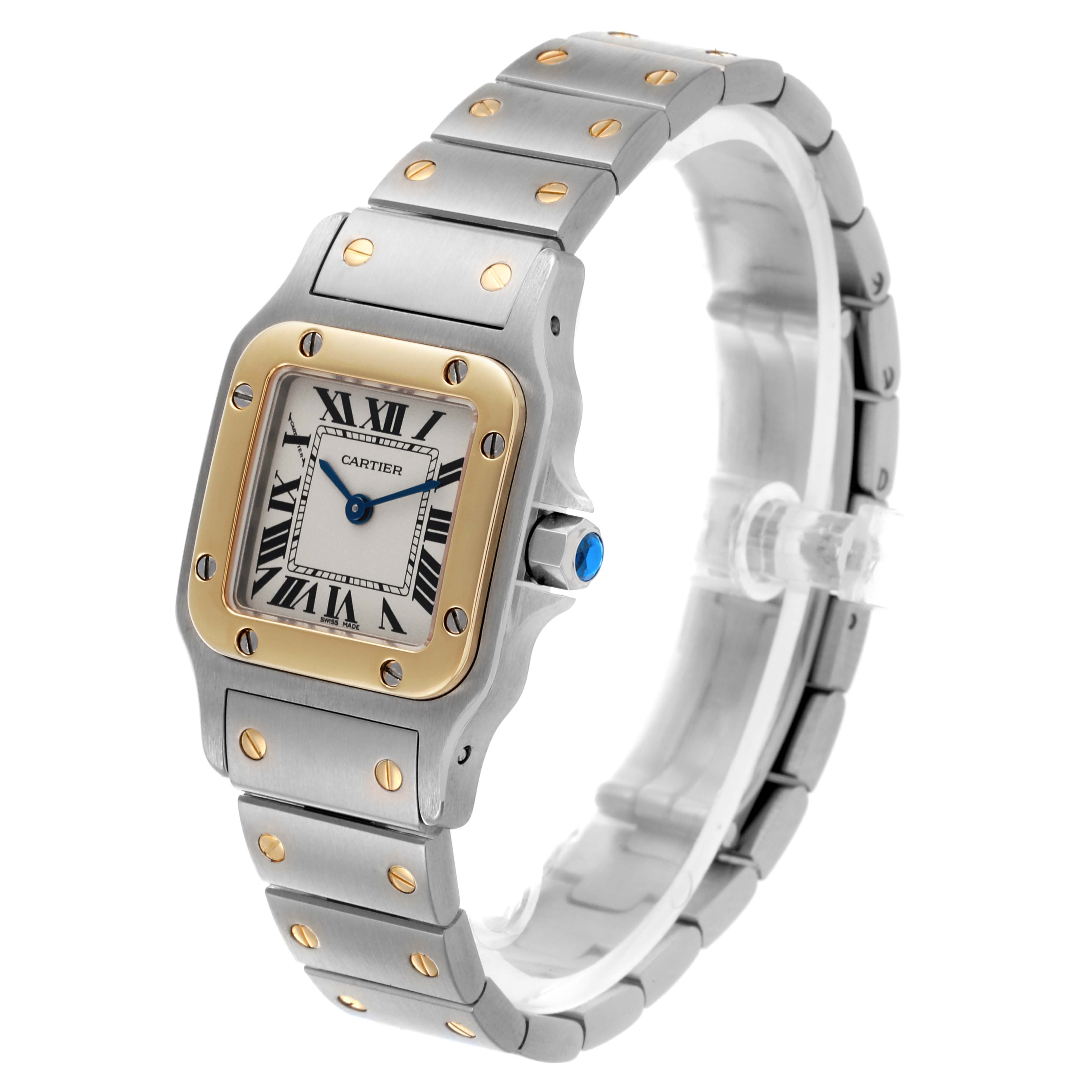The Cartier Santos W20012C4 Women's Steel and Gold (two tone) Silver Dial W20012C4 Women's Steel and Gold (two tone) Silver Dial watch is shown at an angle displaying the face, bezel, crown, and a section of the bracelet.