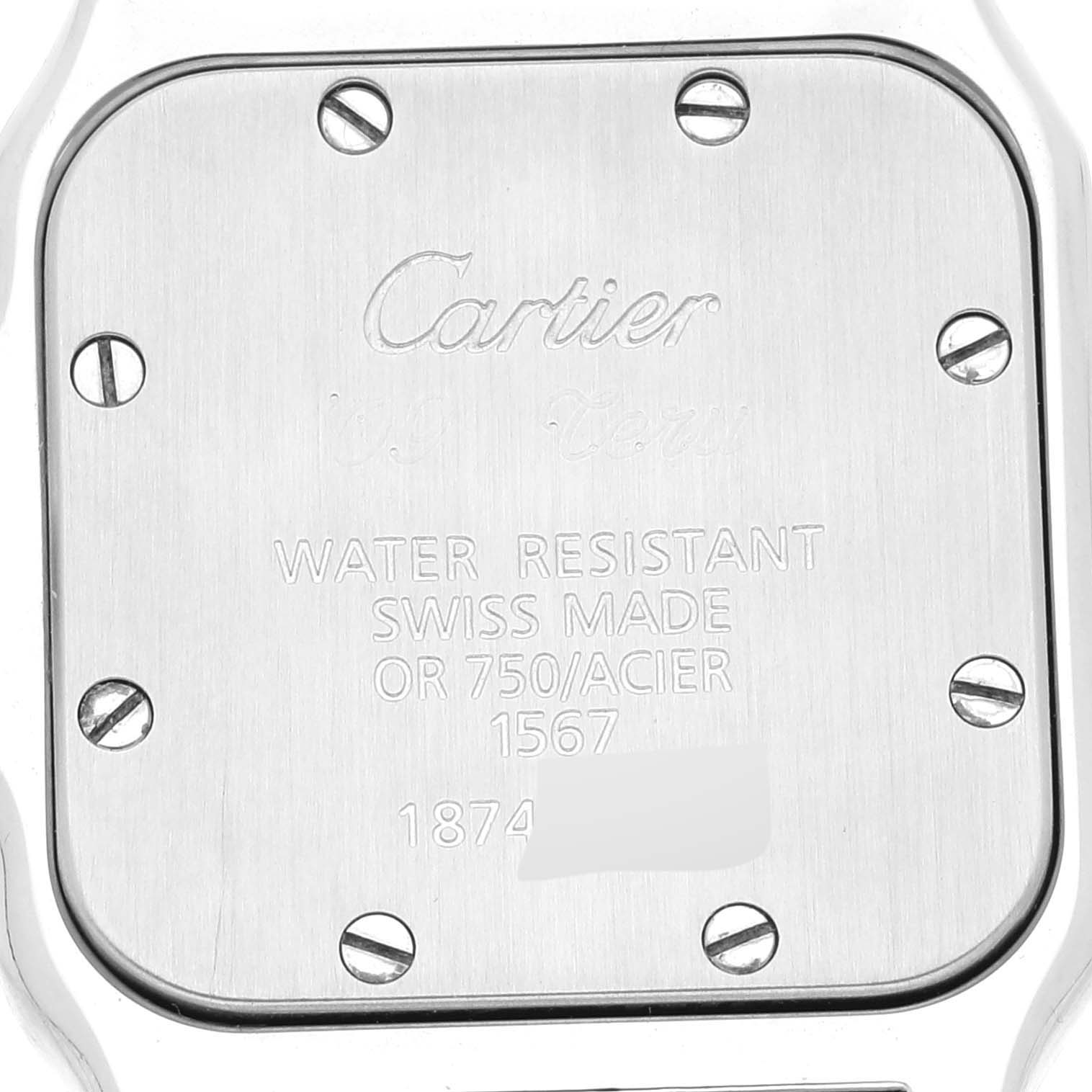This image shows the back case of a Santos watch by Cartier, highlighting its screws and engraved specifications.