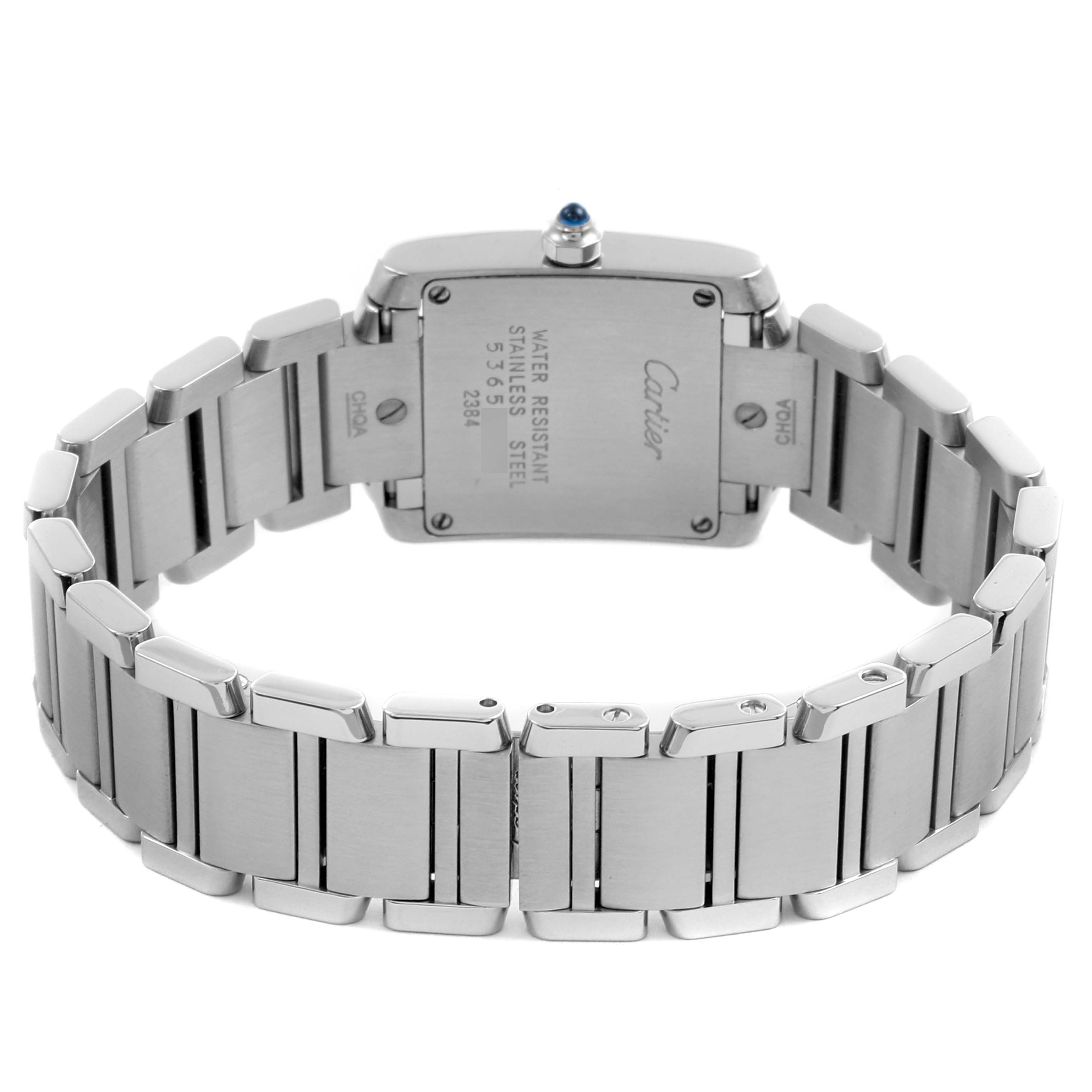 The image shows the back view of the Cartier Tank Française watch, highlighting the stainless steel bracelet and case back.